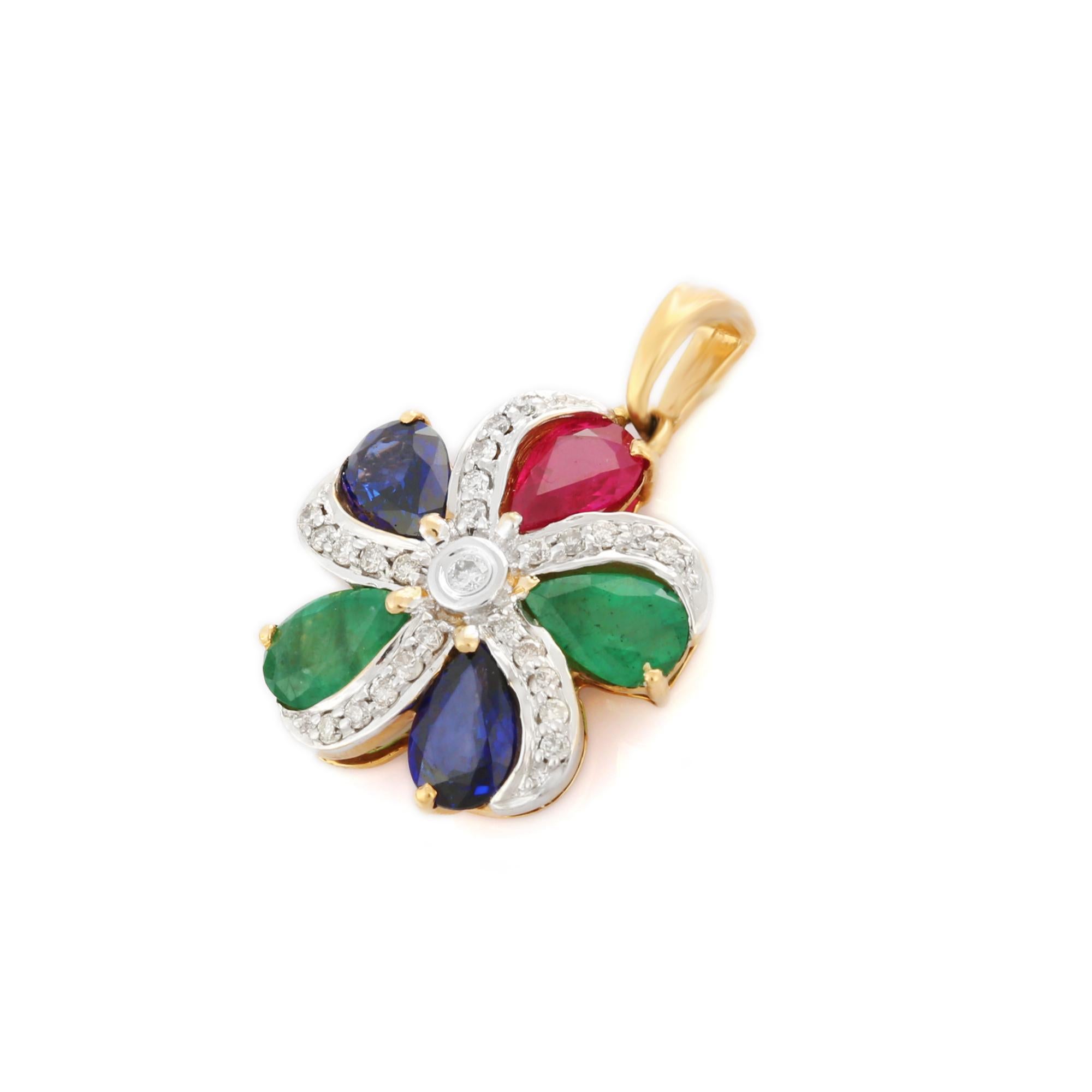 Bespoke emerald, ruby, sapphire and diamond flower pendant in 18k Gold. It has a pear cut gemstone studded with diamonds that completes your look with a decent touch. Pendants are used to wear or gifted to represent love and promises. It's an