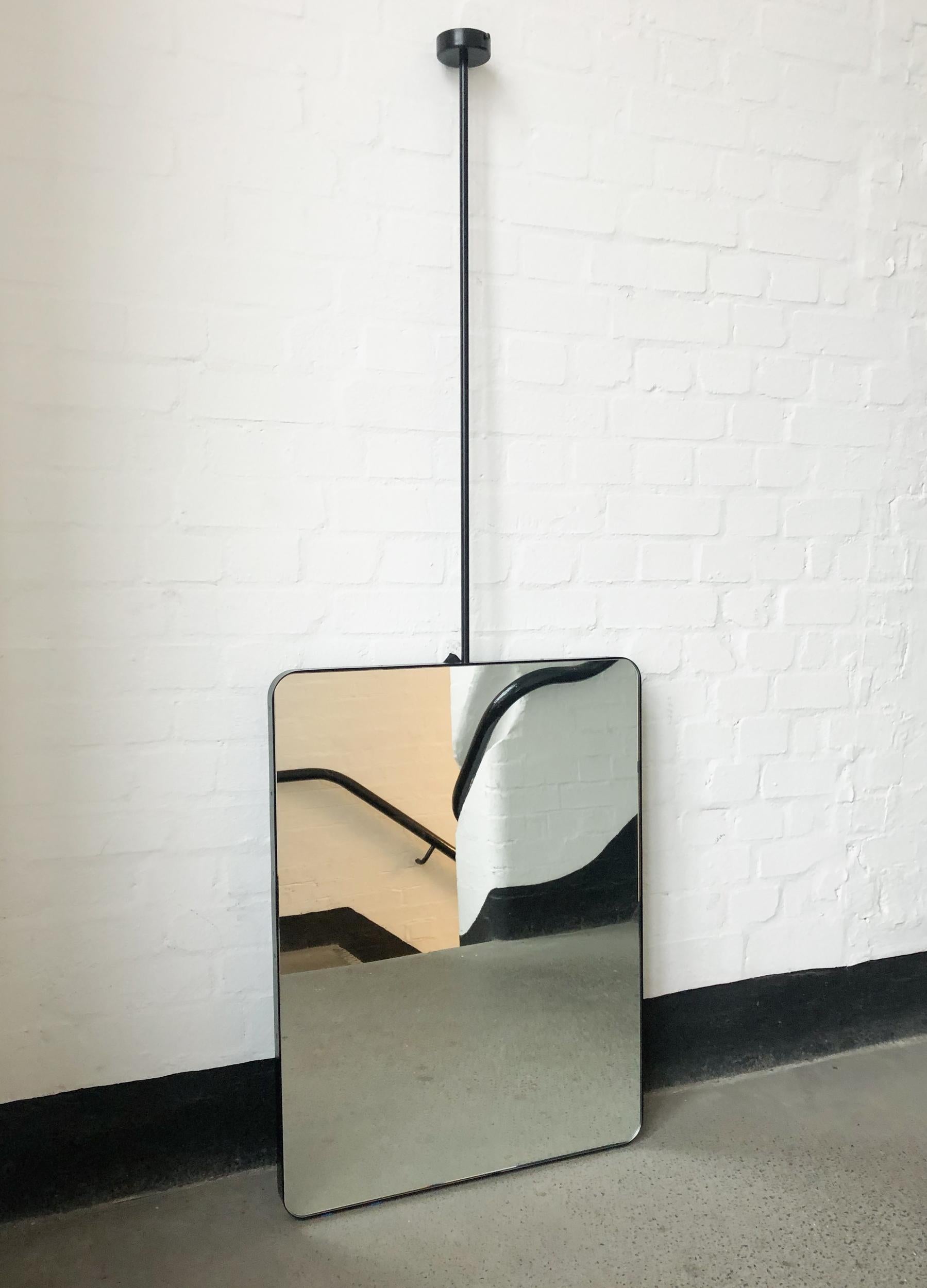 The images in this personal entry illustrate a standard size of the suspended Quadris™ mirror with a black matte frame. All specifications for this particular entry are as detailed in the presentation already provided and approved.

The price in