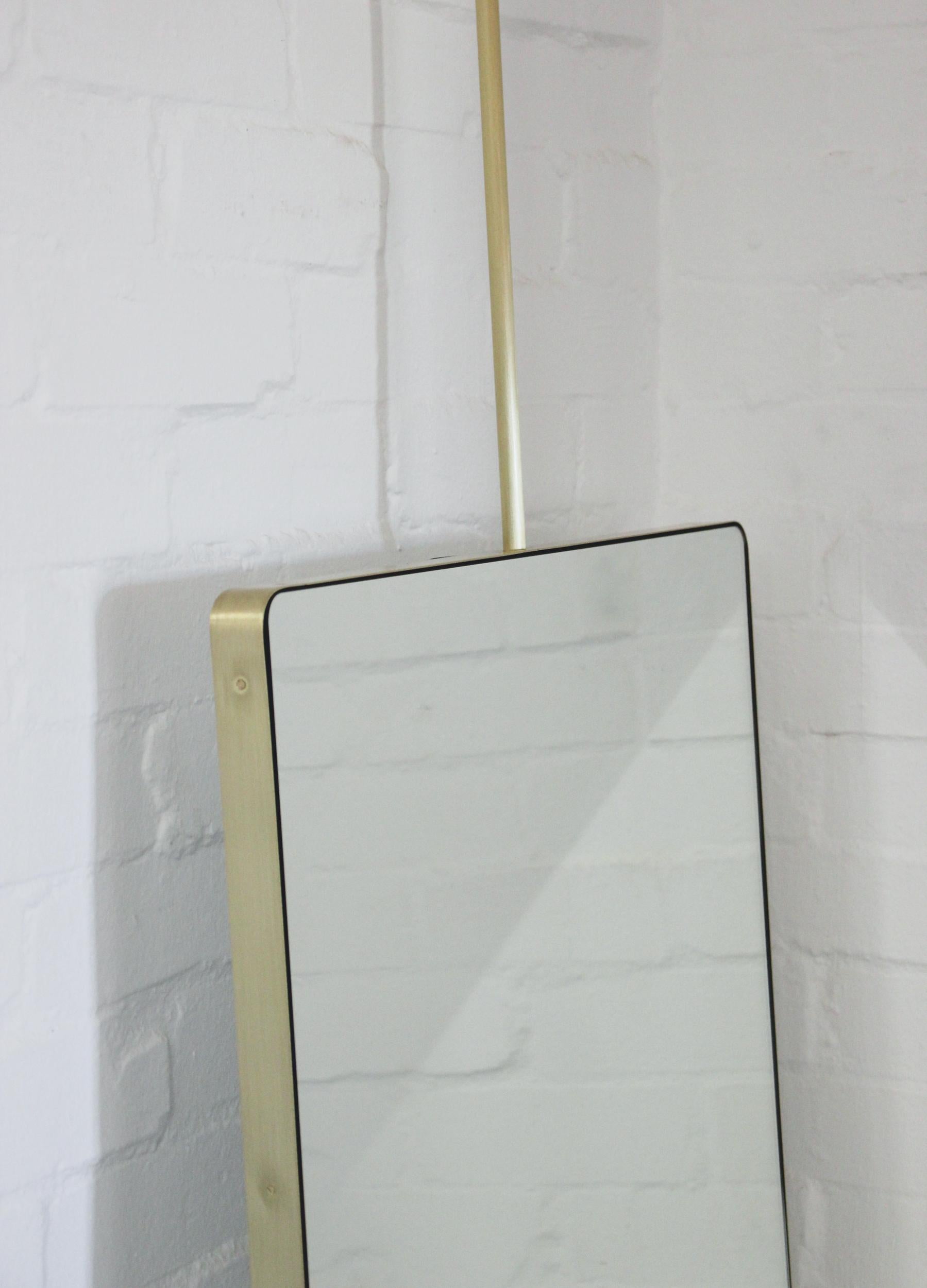 
The images in this personal entry illustrate a standard size of the suspended Quadris mirror with a brushed brass frame. All specifications for this particular entry are as detailed in the presentation already provided and approved.

The price in