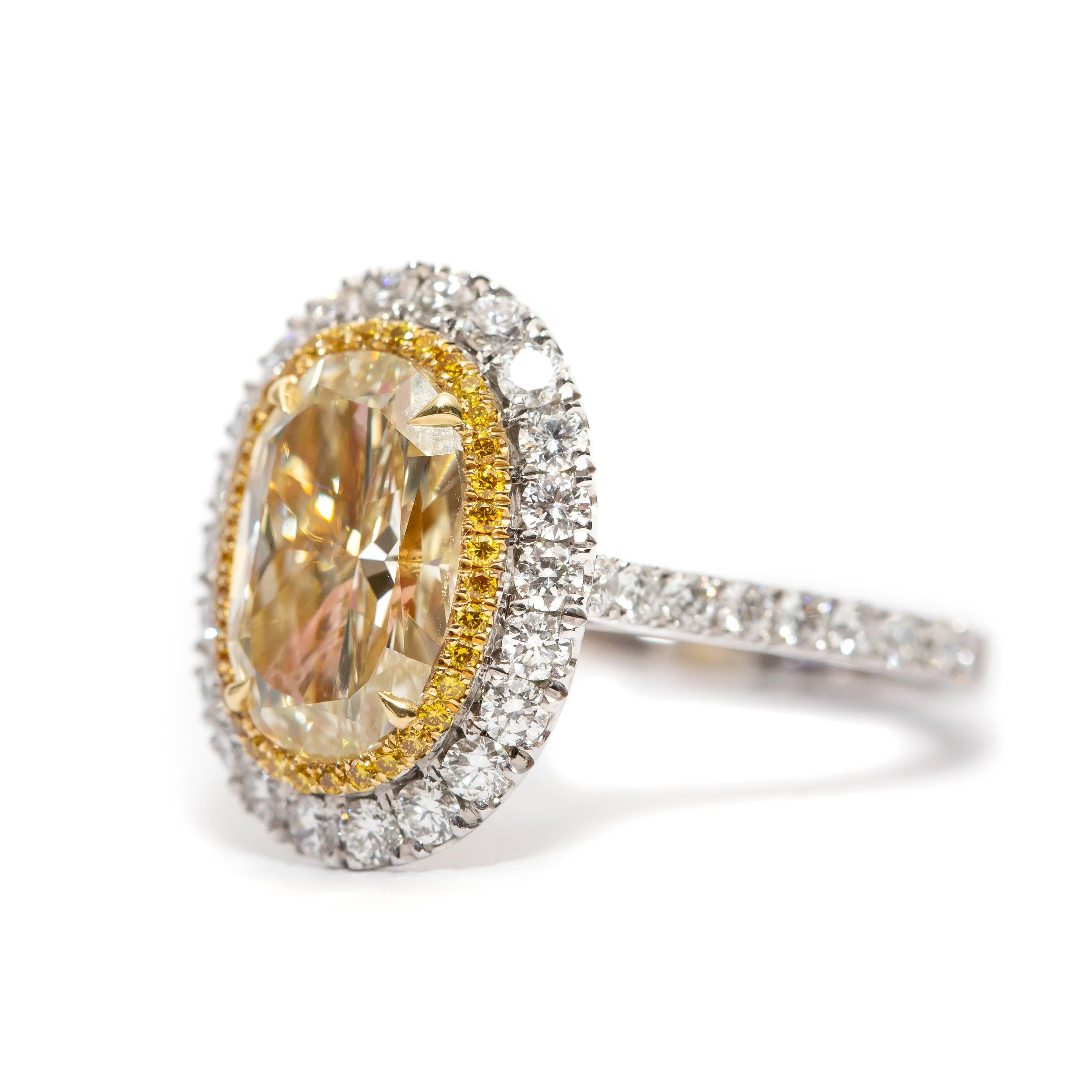 bespoke white gold diamond halo ring