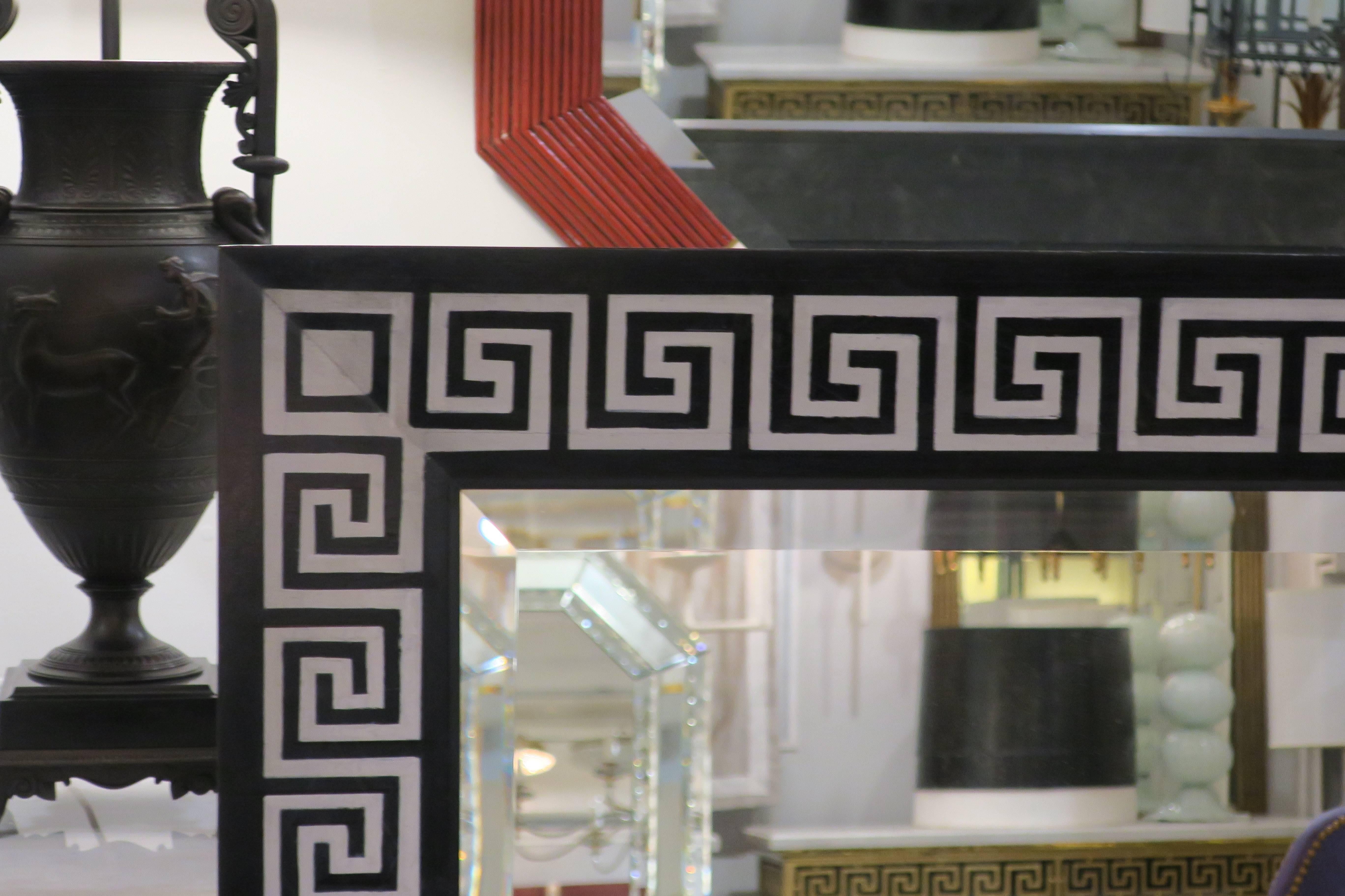 Bespoke hand-decorated mirror with Greek key pattern design along borders.
This mirror is customizable to your specifications with a lead time of 8-10 weeks. Please inquire. 

  