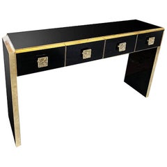 Table console/commode sur mesure en verre noir et laiton moulé de style Art déco italien