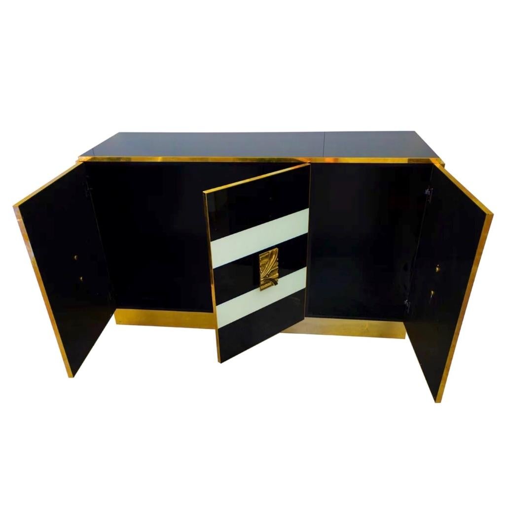 Classic black and white Art Deco stye! What we love about this piece, is the elegance added in the design details: the exceptional cast hardware, the gold rims and to add the choice of colors is yours! as this is a piece entirely customizable.
This