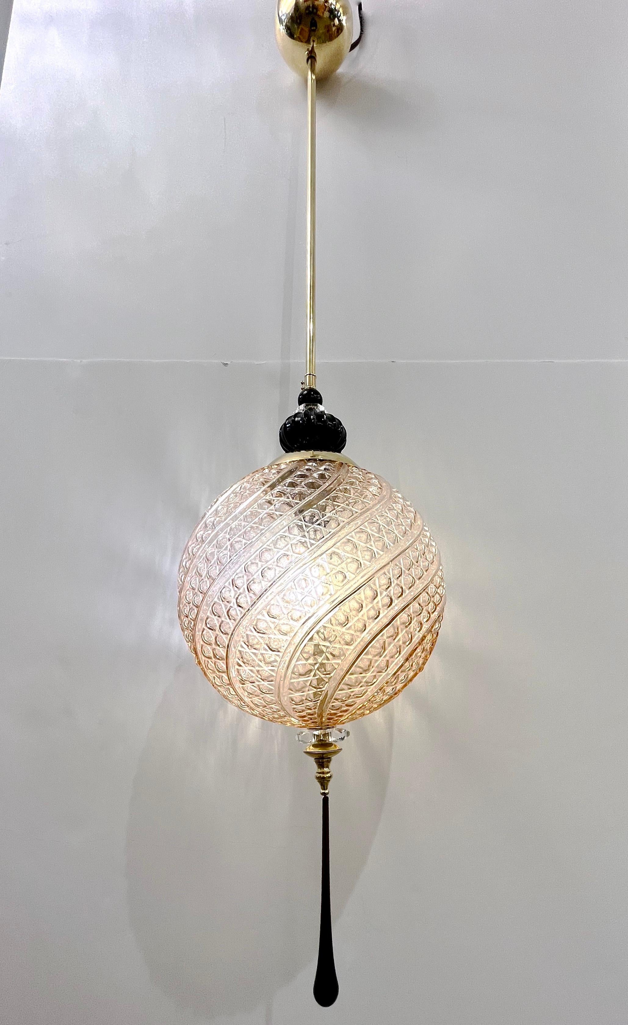 Contemporary orientalist style custom lantern chandelier, of a modern Venetian geometric series with 4 shapes as per images, entirely handcrafted in Italy, here with brass hardware, the organic round sphere in an innovative blown textured Murano