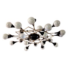 Empotrable de 24 luces geométrico italiano a medida de latón lacado en negro y cristal blanco