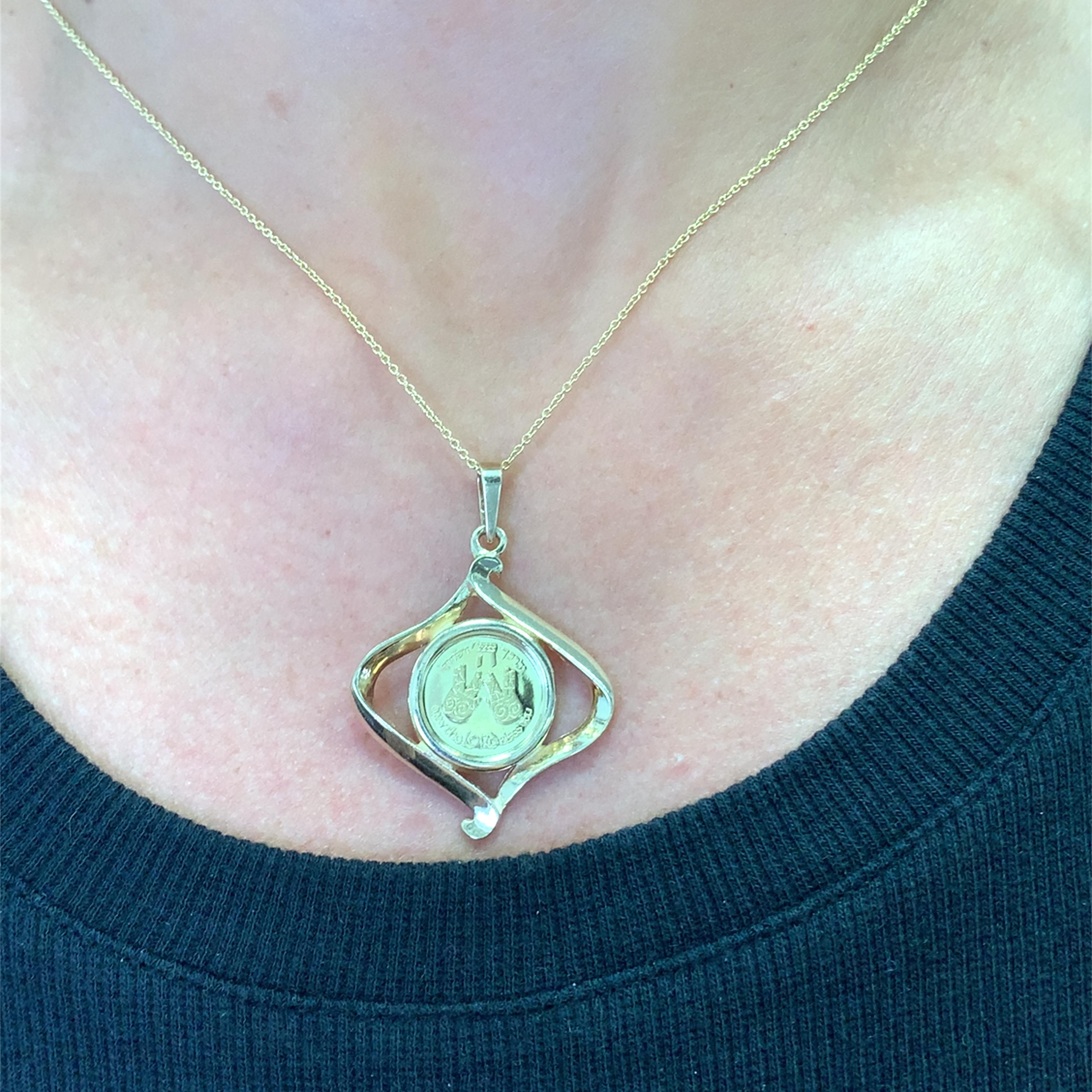 Embrace timeless elegance Jewish religious coin pendant with this bespoke 18k yellow gold pendant. The unique, stylized design captures sophistication, offering a touch of understated luxury. Perfect for elevating any ensemble with its radiant
