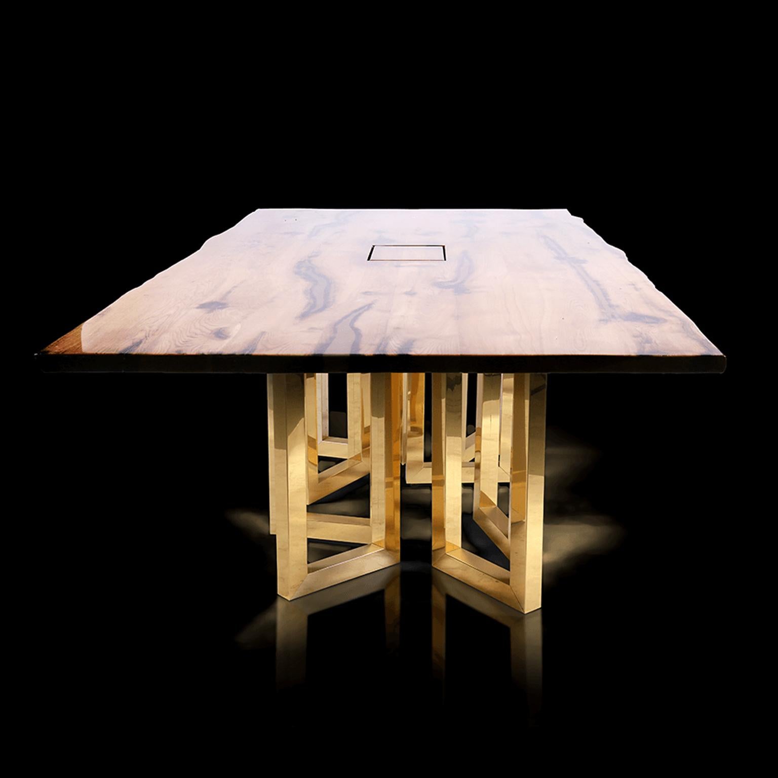 An eye-catching interplay of shapes and proportions, this table encompasses fine craftsmanship and an innovative design that will enhance any modern meeting room or dining room. This luxurious office table is handmade from old, reclaimed oak with