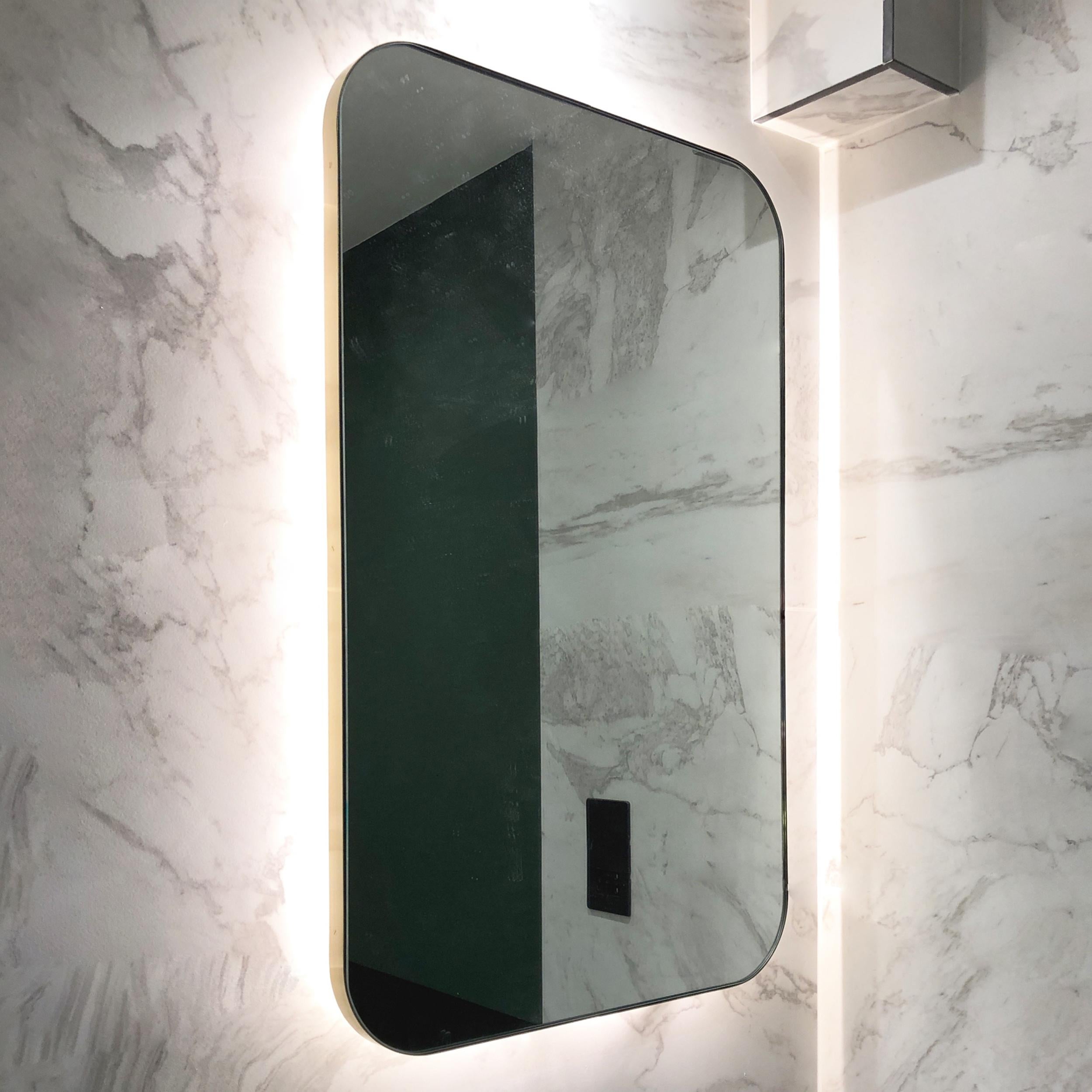 This bespoke entry is provided for an order of one mirror.

The images in this bespoke listing do not represent the approved modifications, and they refer to a standard size of the Quadris Rectangular Back Illuminated Contemporary Mirror with Brass