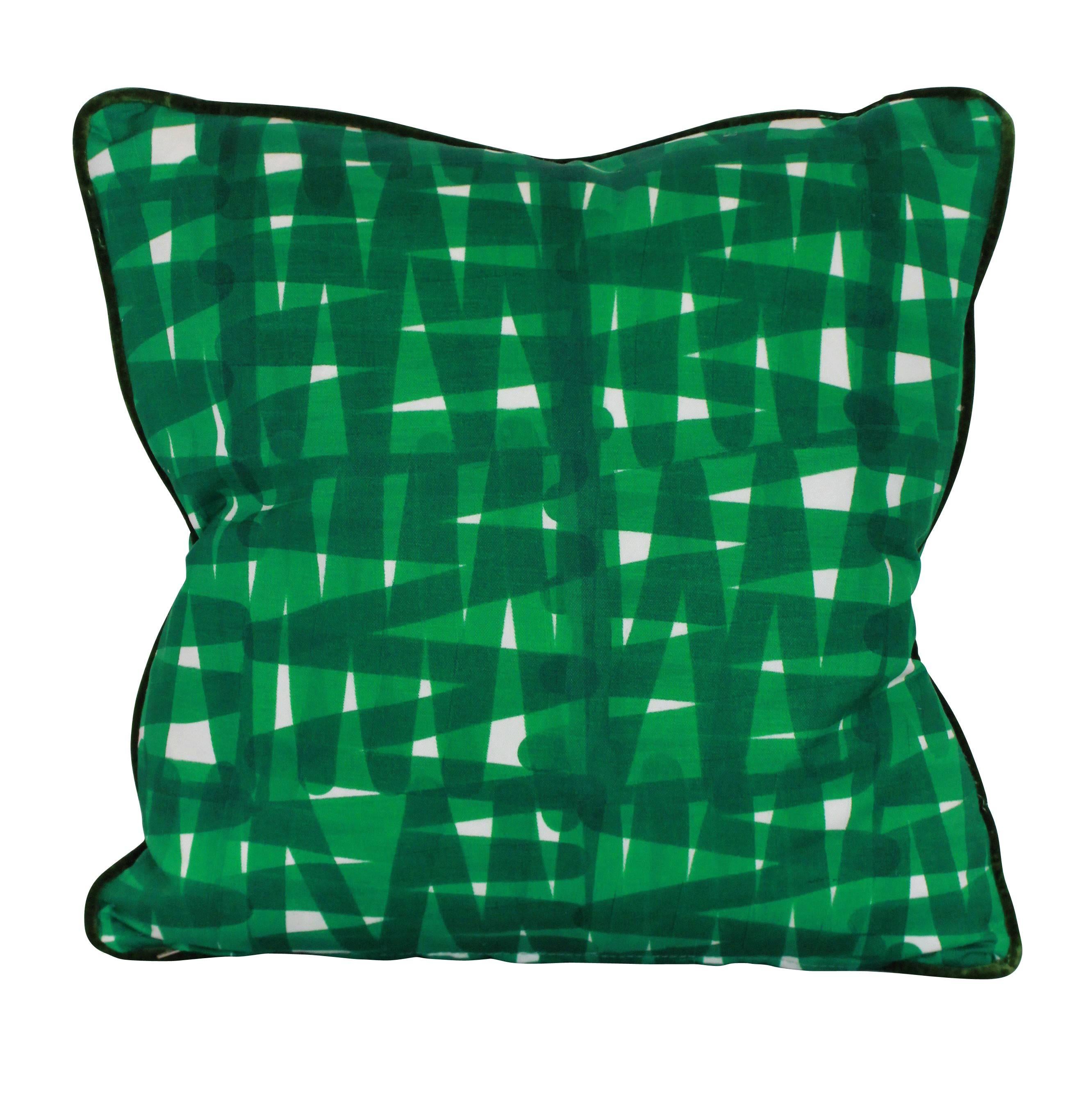 A set of four bespoke cushions in a vivid emerald green Livio De Simone fabric, piped with designers guild velvet. With feather pads.

Sold individually.

Price per single unit.