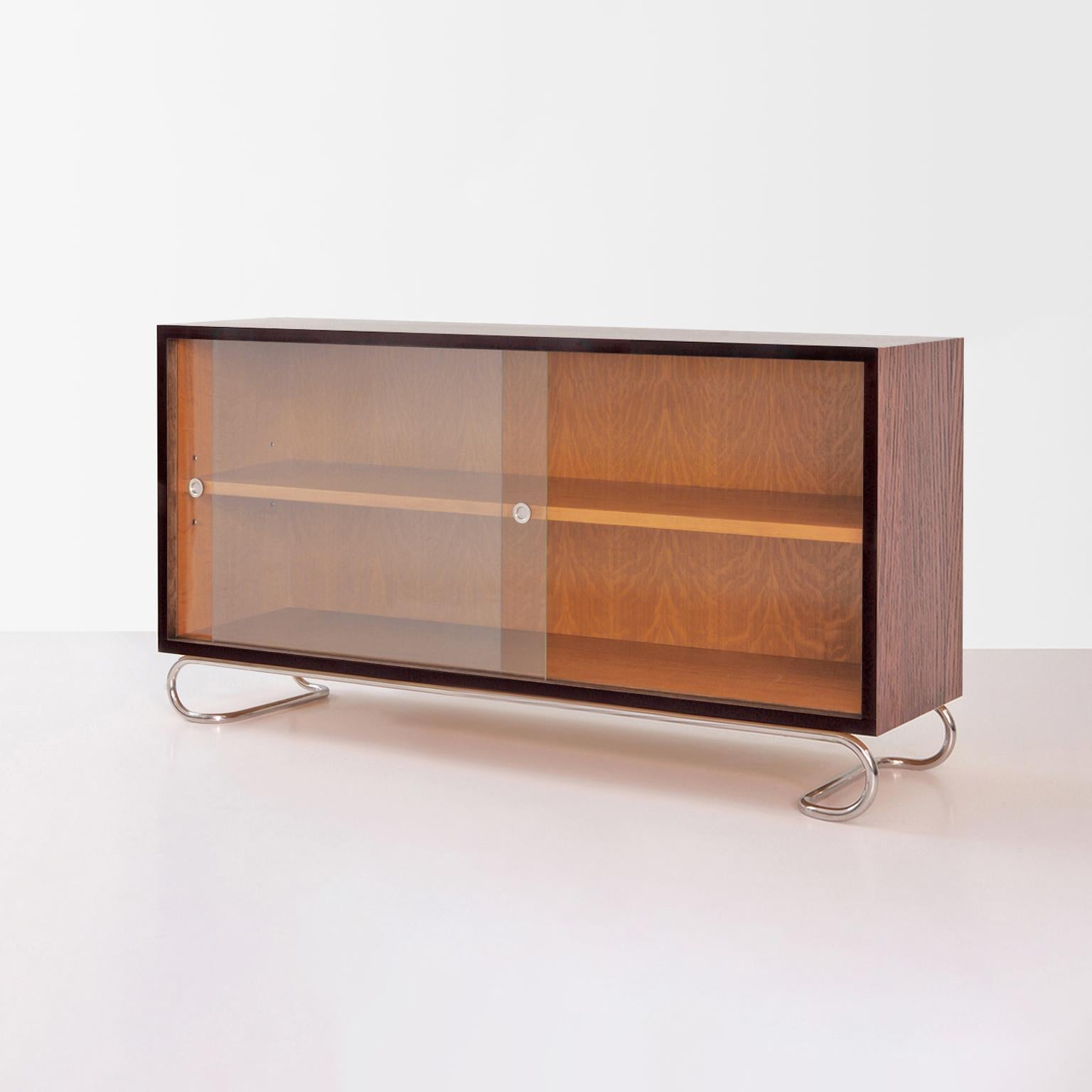 Modern Bespoke Low Bookcase, Stained Wood, Sliding Glass Panels and Tubular Steel Base For Sale