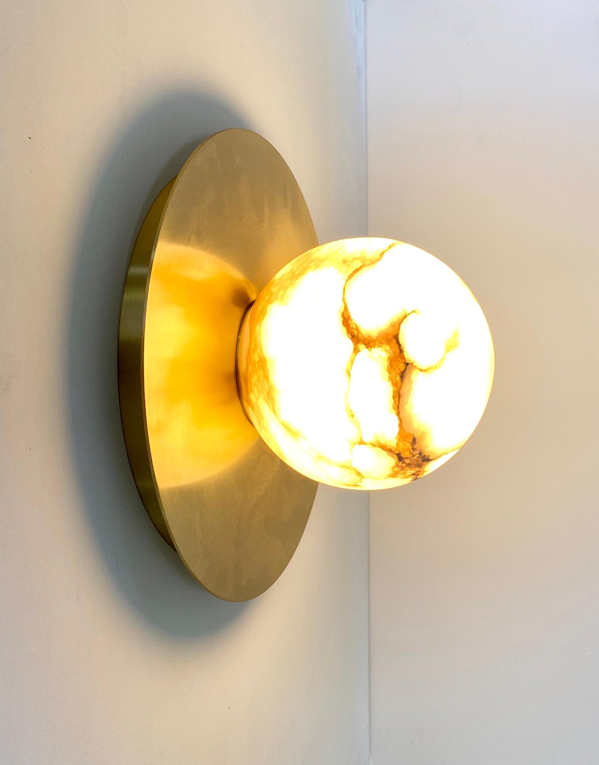 round alabaster wall sconce