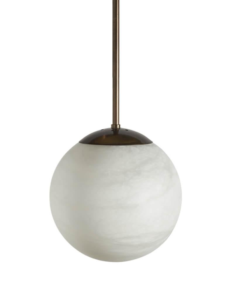 The Maxi Alabaster Moon pendants are a stunning set of three lighting fixtures that evoke the magic of full moon nights. These pendants feature large, illuminated globes that create a sense of weightlessness and beauty, as if they were floating in