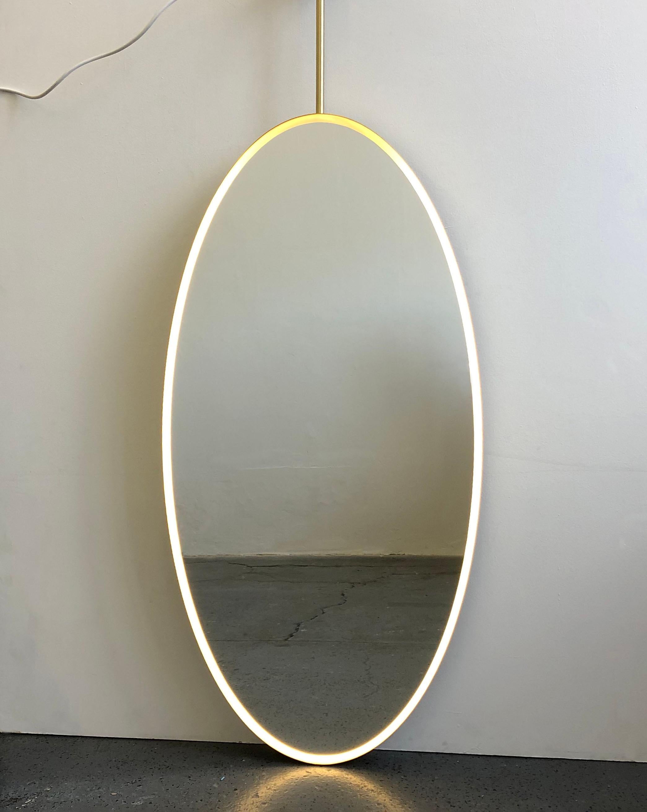 British Bespoke mirror for Angela Ovalis Suspended Brass Frame Front Illumination 2 rods