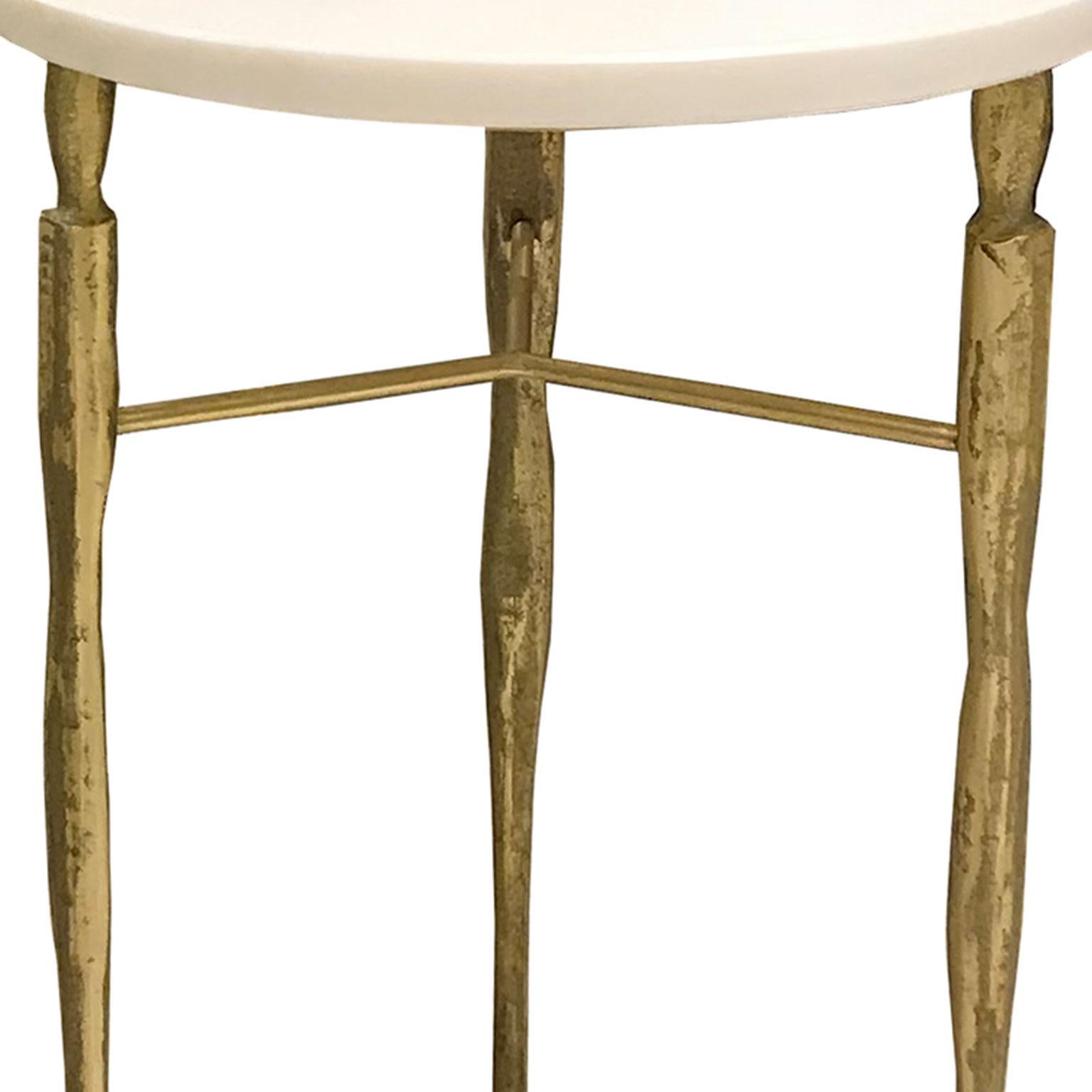 Bespoke side table Ellie in a modern design with a Giacometti inspired base in hand hammered metal with a gold finish. The round top is available in white or black marble, granite, wood or glass. 
Custom designed piece, made to order. 
Sizes: 14