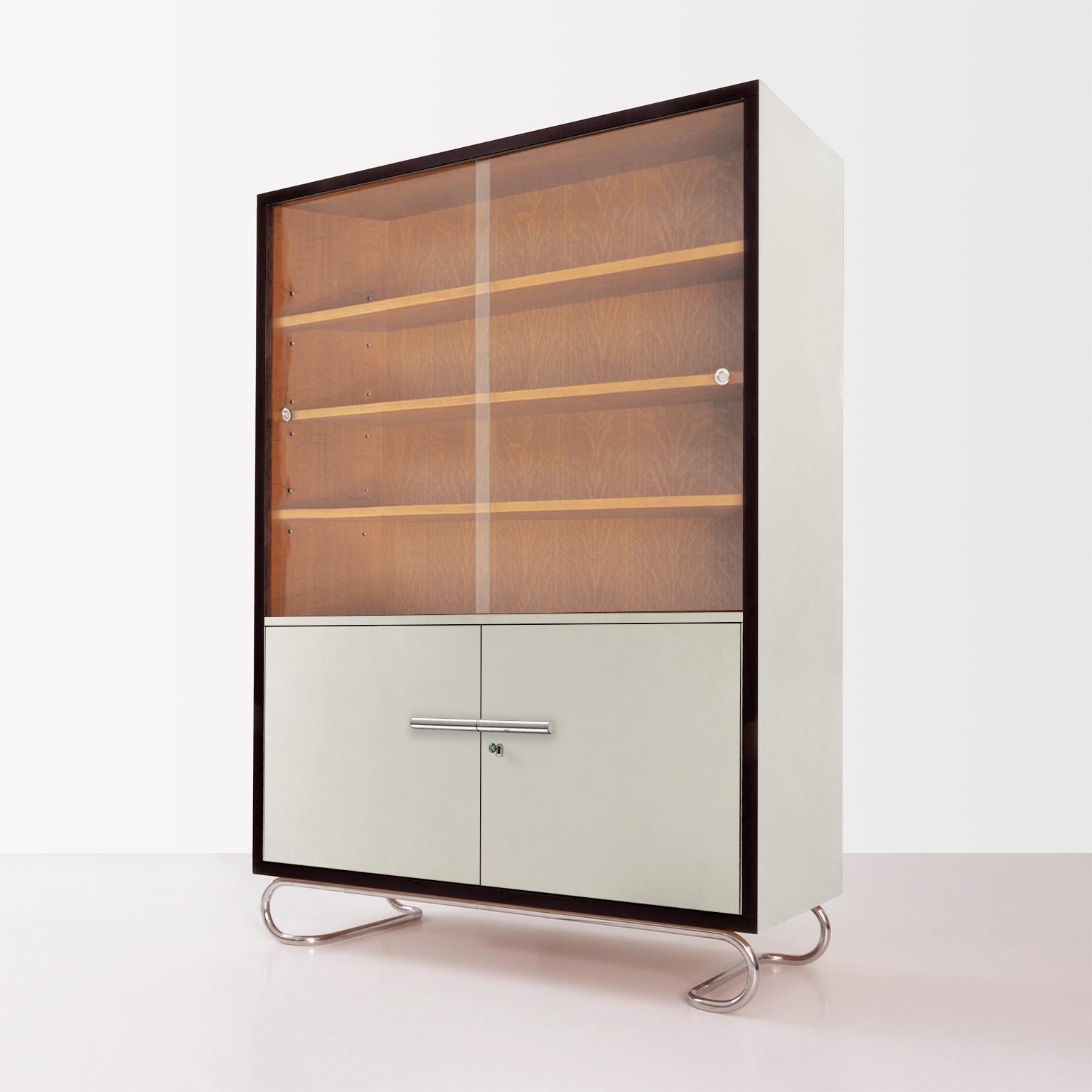 Bespoke modernism showcase cabinet designed and manufactured by GMD Berlin. Wood lacquering in various colors and finish. Available on request in different amounts.