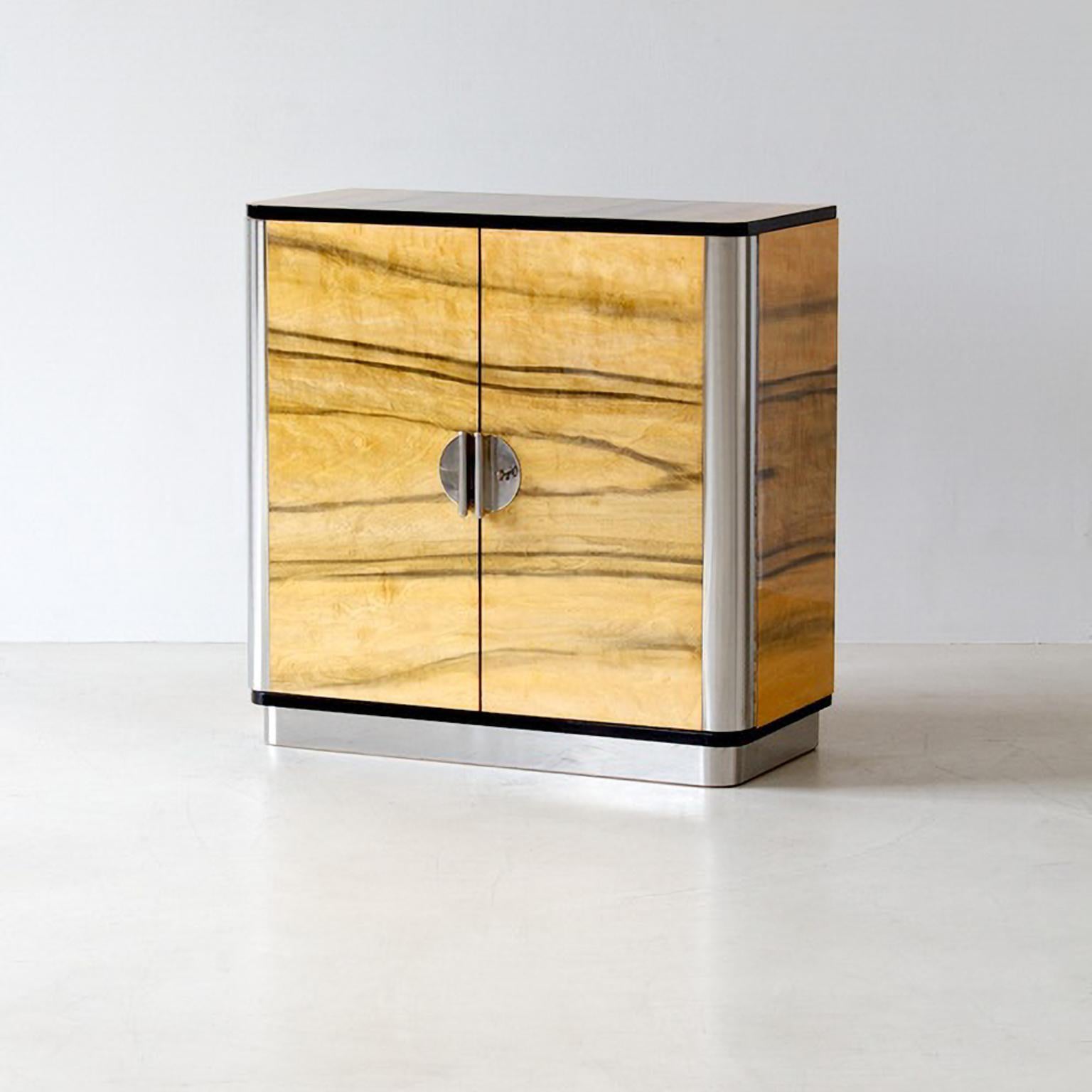 Customized two-door sideboard, manufactured by GMD Berlin, exclusively presented in our Rudolf Vichr Collection.

These high-quality, handmade furniture in a classic modern timeless design, are made from selected materials according to traditional