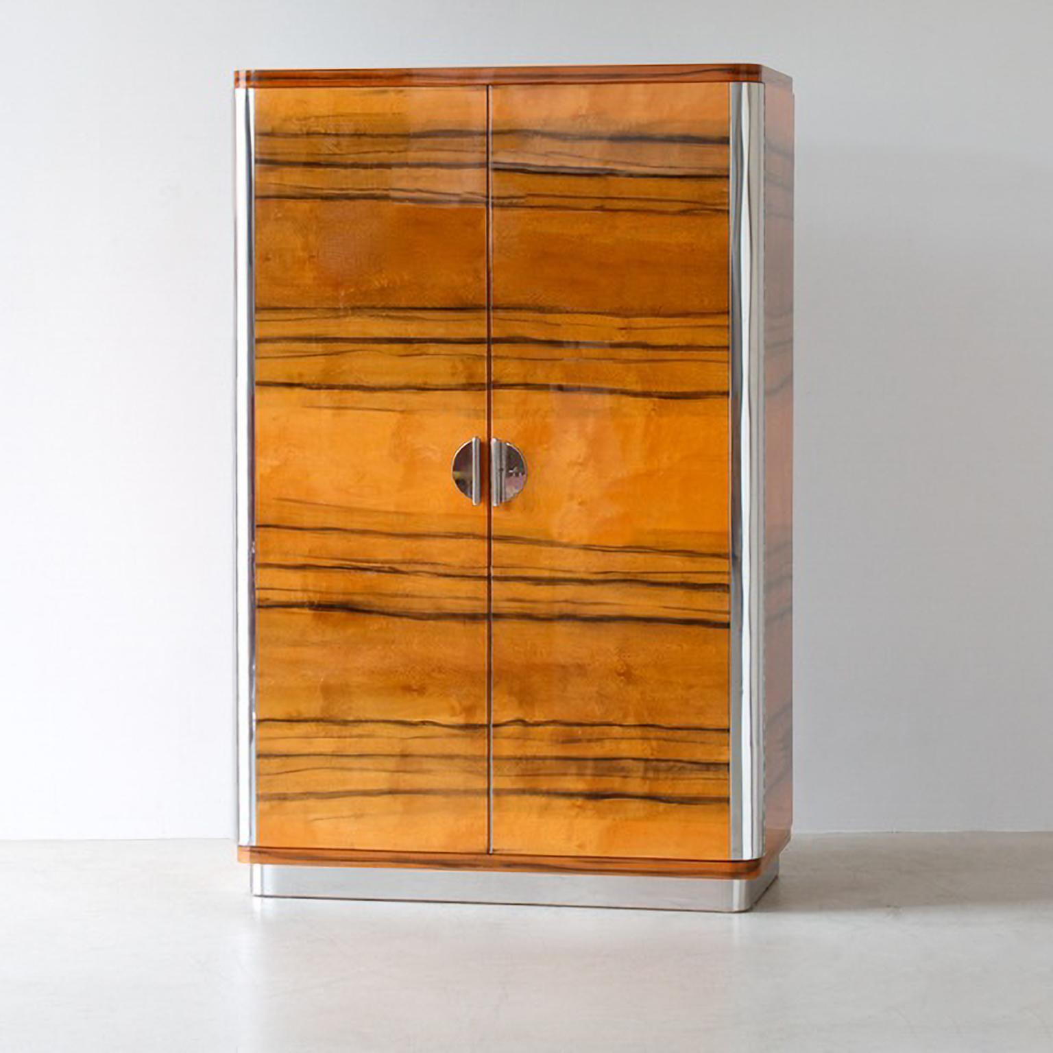 Custom made three-door wardrobe / armoire, designed and manufactured by GMD Berlin, exclusively presented in our Rudolf Vichr Collection.

These high-quality, handmade furniture in a classic, timeless design is made from selected materials according