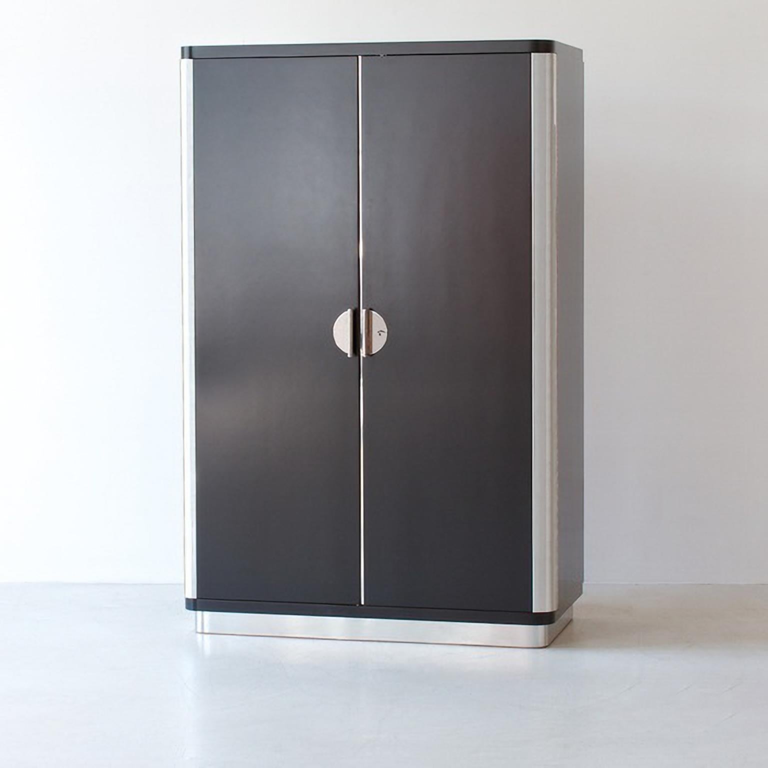 Custom made three-door wardrobe / armoire, designed and manufactured by GMD Berlin, exclusively presented in our Rudolf Vichr Collection.

These high-quality, handmade furniture in a classic, timeless design is made from selected materials according