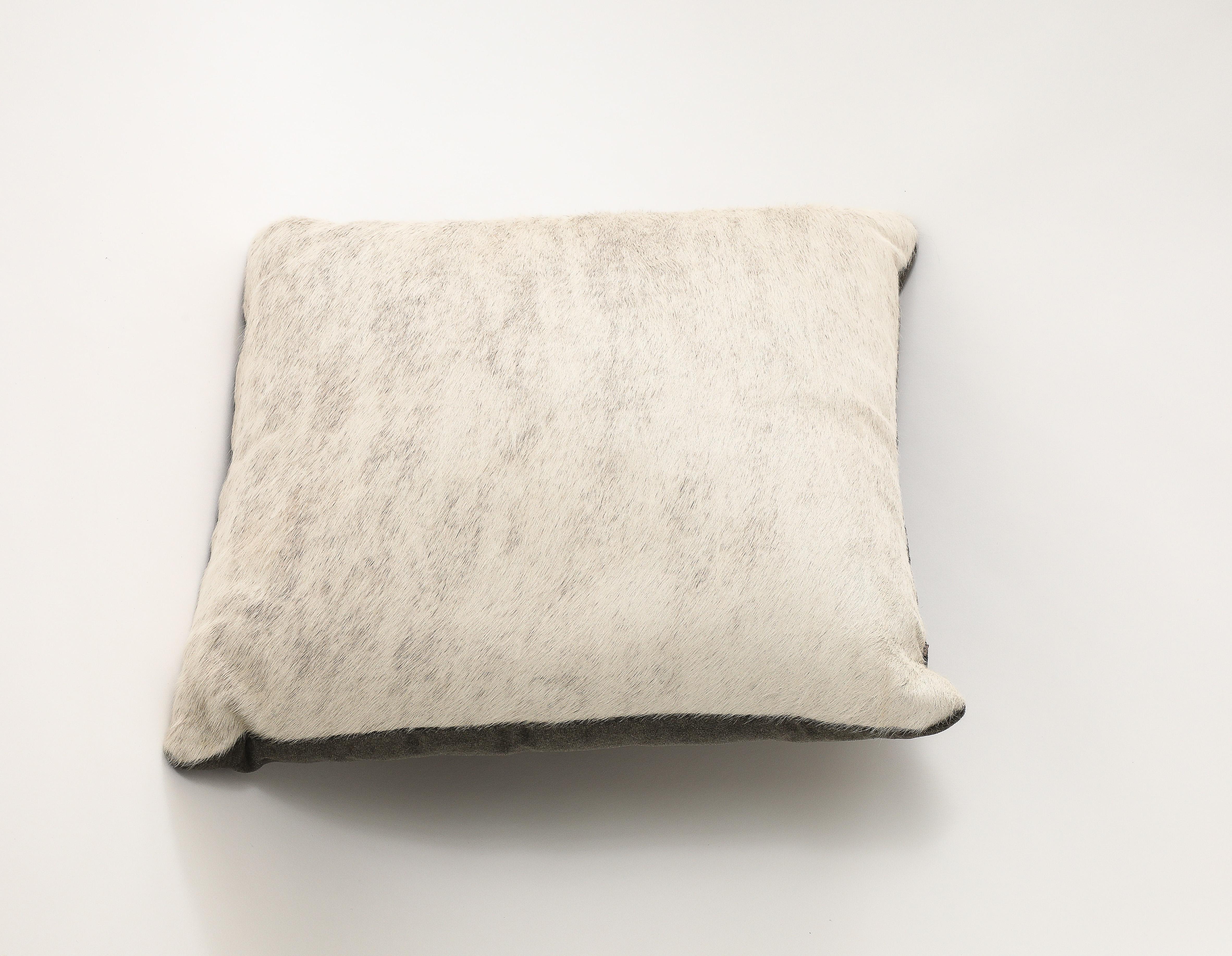 Off white, Grey brindle pony hide pillow with a grey cotton velvet back. 
Feather & Down insert, zipper on side