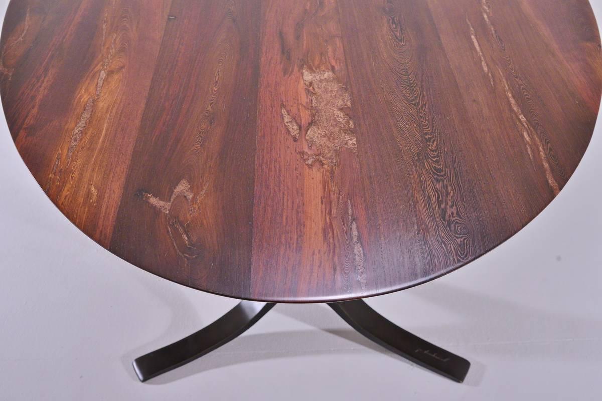We just finished this table for Bangkok Design Week. We had stumbled on this amazing hardwood from a Heritage house near Chiang Mai, Thailand. While this wood is extremely machine-unfriendly, we felt we were sanding off stones, the grain is truly