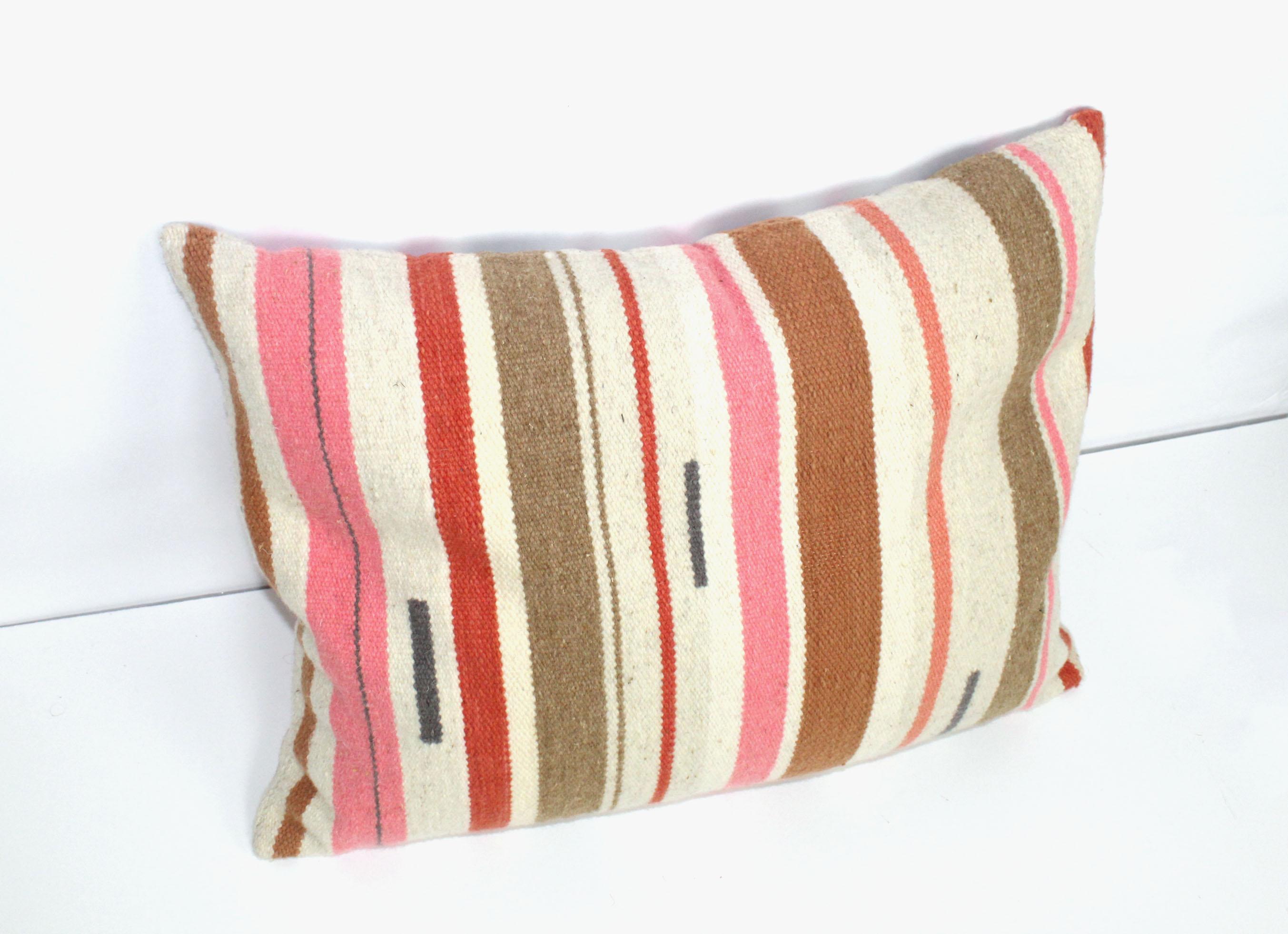 This bespoke pillow is handmade from 100% natural materials in the maker's studio in Brooklyn, NY.

The wool is sourced from a village south Oaxaca, a blend of merino and churro wool, and spun with variations that give it incredible texture while