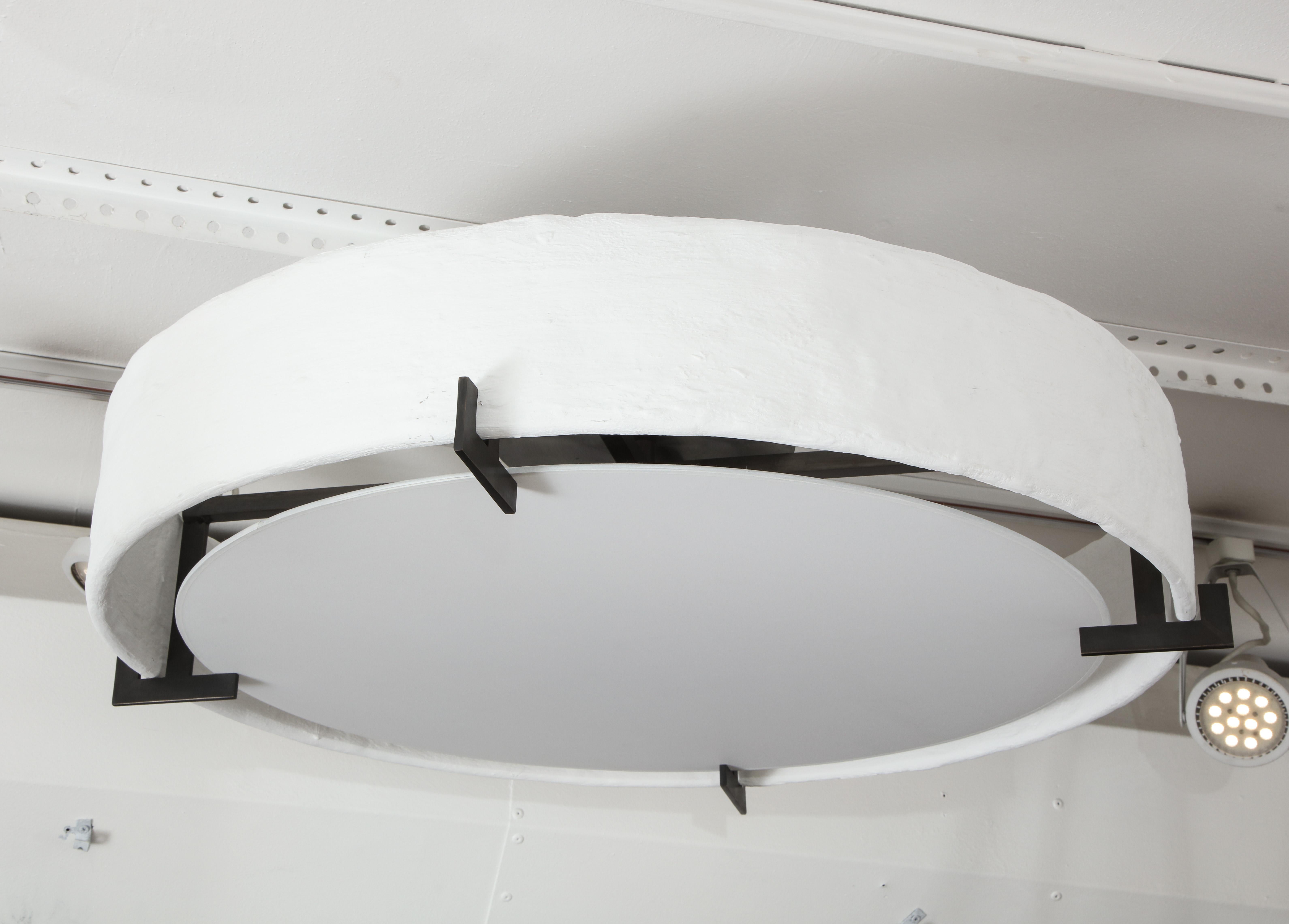 Bespoke plaster and iron fixture in the manner of Jean Michel Frank.
Item uses (3) e-12 candelabra bulbs up to 40 watts each.
Production Lead Time for custom fixture is 8-10 weeks.
NOTE: We highly recommend that our plaster fixtures be crated when