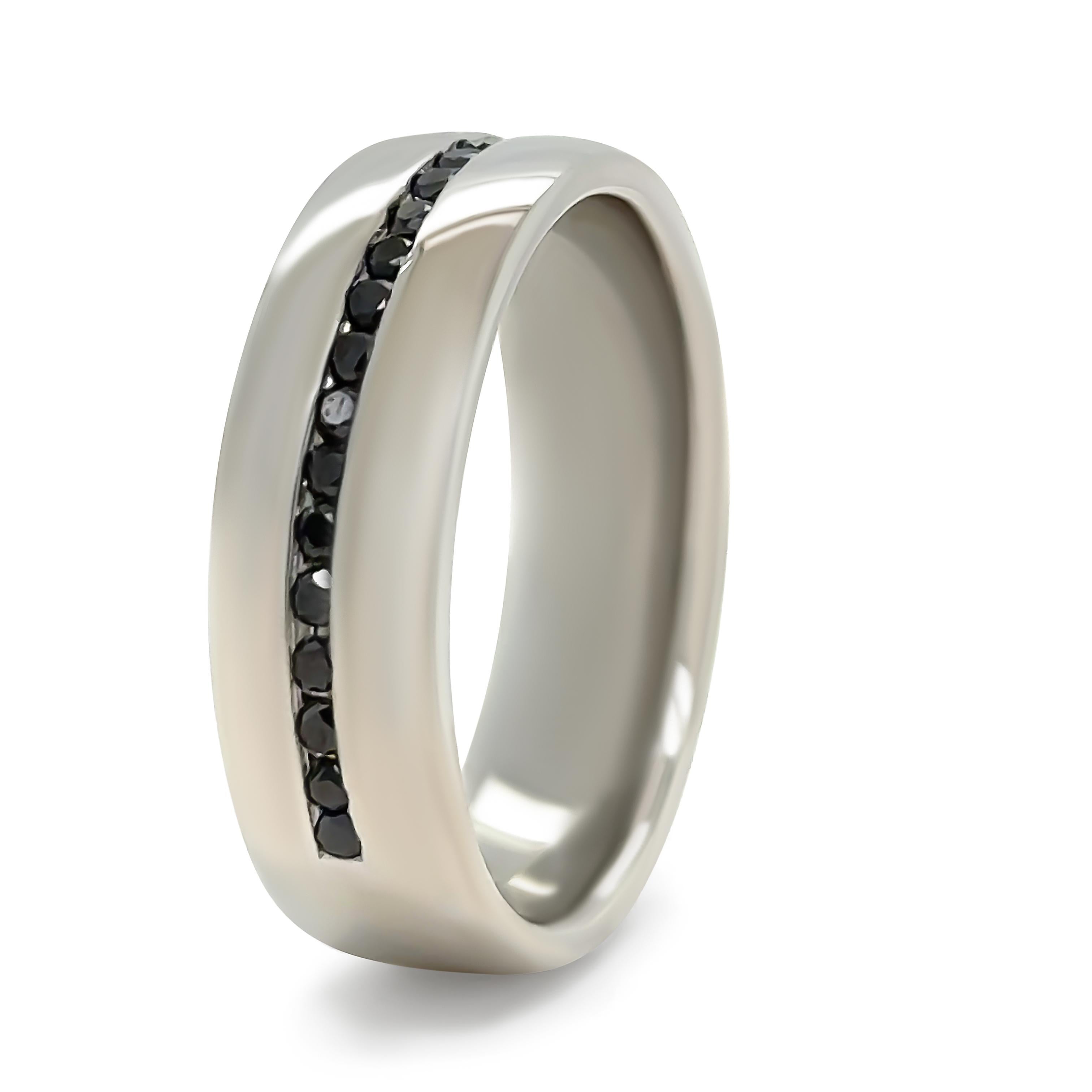 A Bespoke Men's Diamond Wedding Band, made of Platinum. Set with 30 Round, Brilliant Cut Black Diamonds with a total weight of 0.20ct.

Metal: Platinum
Carat: 0.20ct 
Colour: N/A
Clarity: N/A
Cut: Round Brilliant Cut
Weight: 17.5