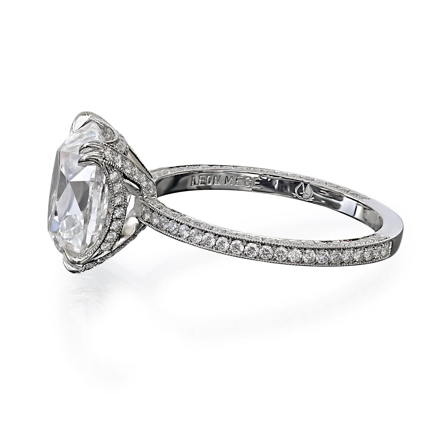 Cosmo™ engagement ring featuring the GIA-certified 2.12 ct G/VS1 True Antique™ cushion diamond.
The center stone is accentuated with bright-cut pave set delicately in the basket and on all three sides of the uniform shank completed with millegrain