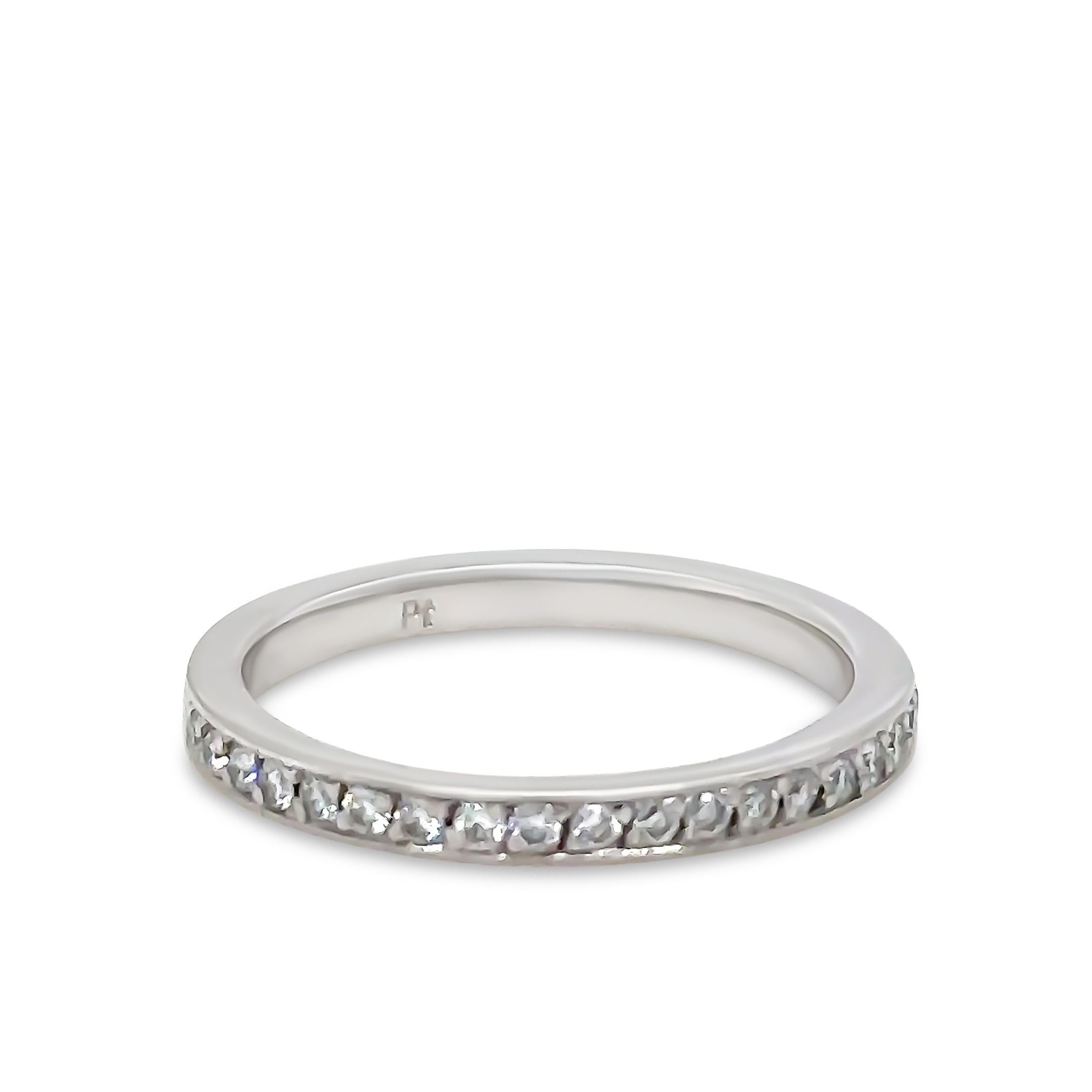 A Bespoke Diamond Wedding Ring. made of Platinum. Featuring 20 Round Brilliant Cut Diamonds bead set on a 2.1mm Band. F Colour, VS Clarity, with a total carat weight of 0.20ct. 

Metal: Platinum
Carat: 0.20ct 
Colour: F
Clarity: VS
Cut: Round