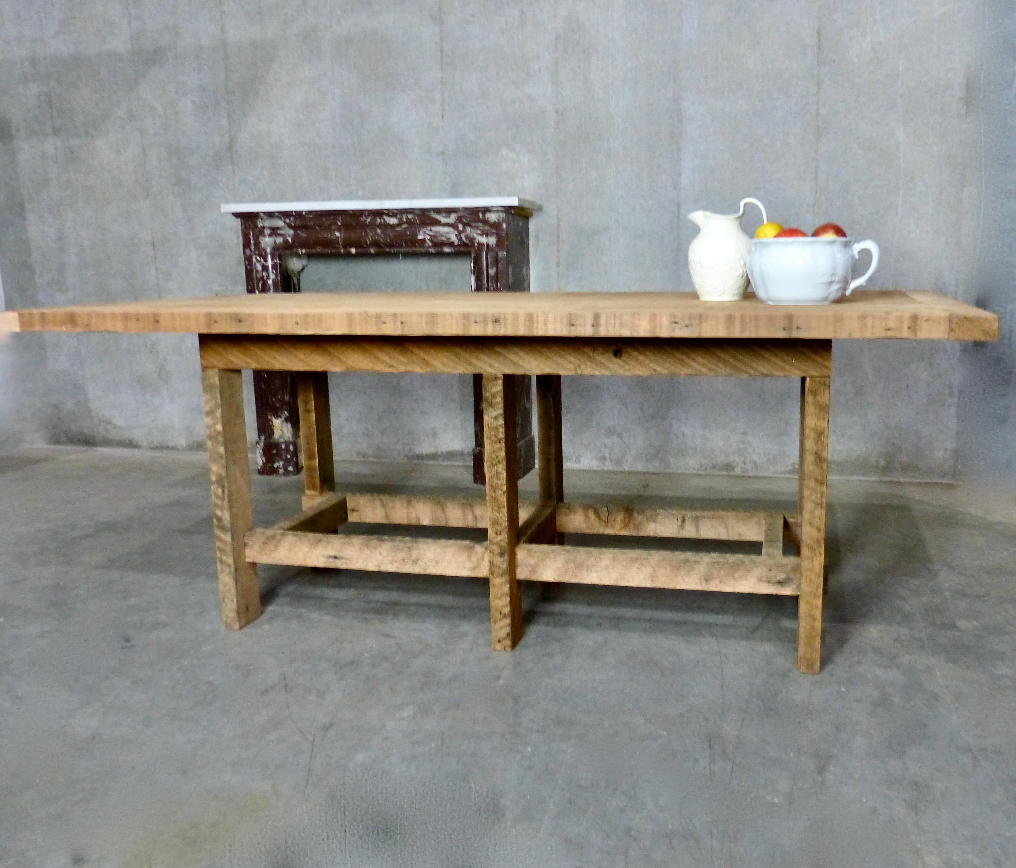 Bespoke solid reclaimed fir raw plank table with reclaimed wood frame. Frame features six post-style legs and cross bars. Table designed to show top fresh cuts.


Dimensions: 30 H” x 78 W” x 36 D”.