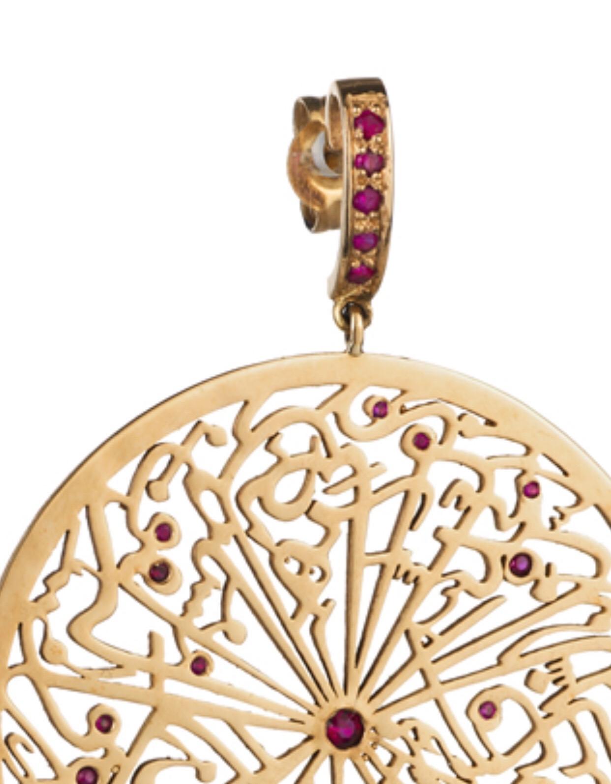 From the Parisa London Collection, these artistically stylised handmade filigree earrings are made with heavy 18 karat gold, set with round cut rubies. A matching pendant, ring and bracelet is available under separate listing.

Ruby Colour: Red
Cut: