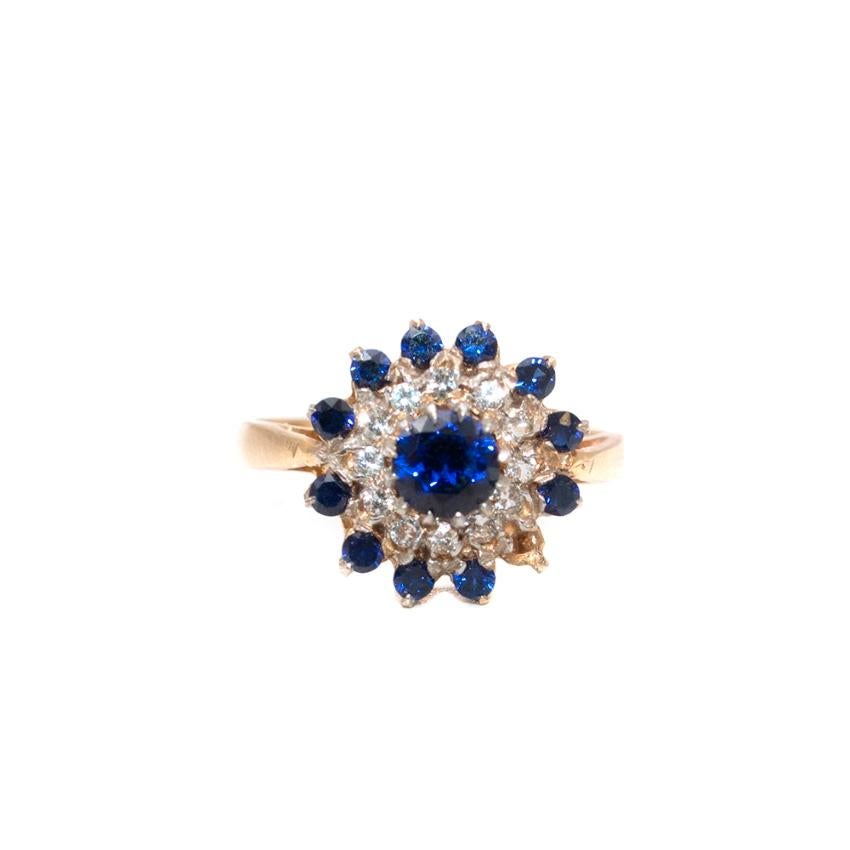 Bespoke Sapphire & Diamond Cluster Gold Ring Ring

- gold band 
- sapphire larger stone in the centre
- diamond surrounding cluster 
- sapphire trim 

- 9kt Gold, Sapphire and Diamond Stones

Ring size 7