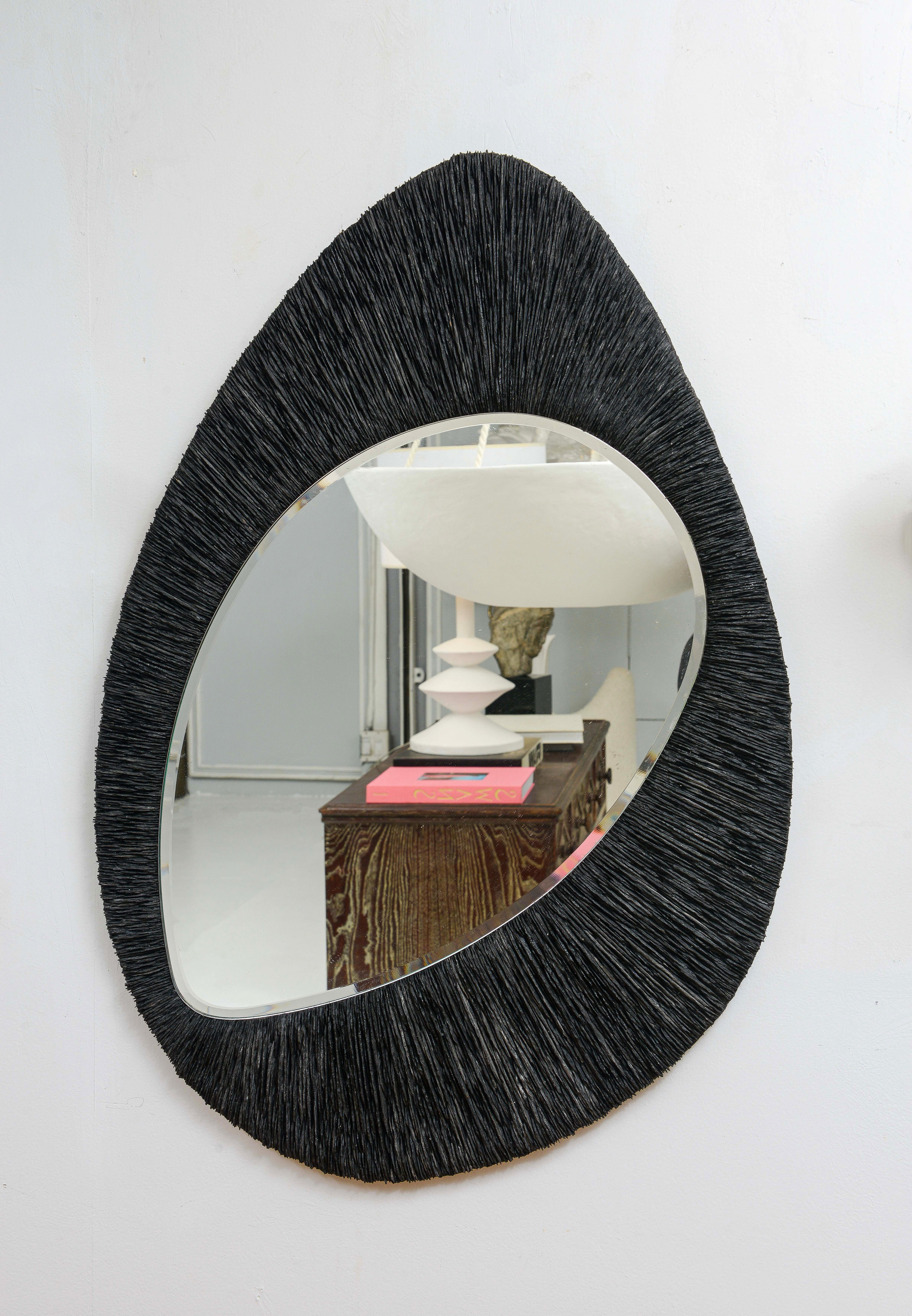 Bespoke sculptural slate mirror.
Please note that this mirror is made in France and can be customizable to your specifications with a lead time of 8-10 weeks. One mirror is currently available.
  