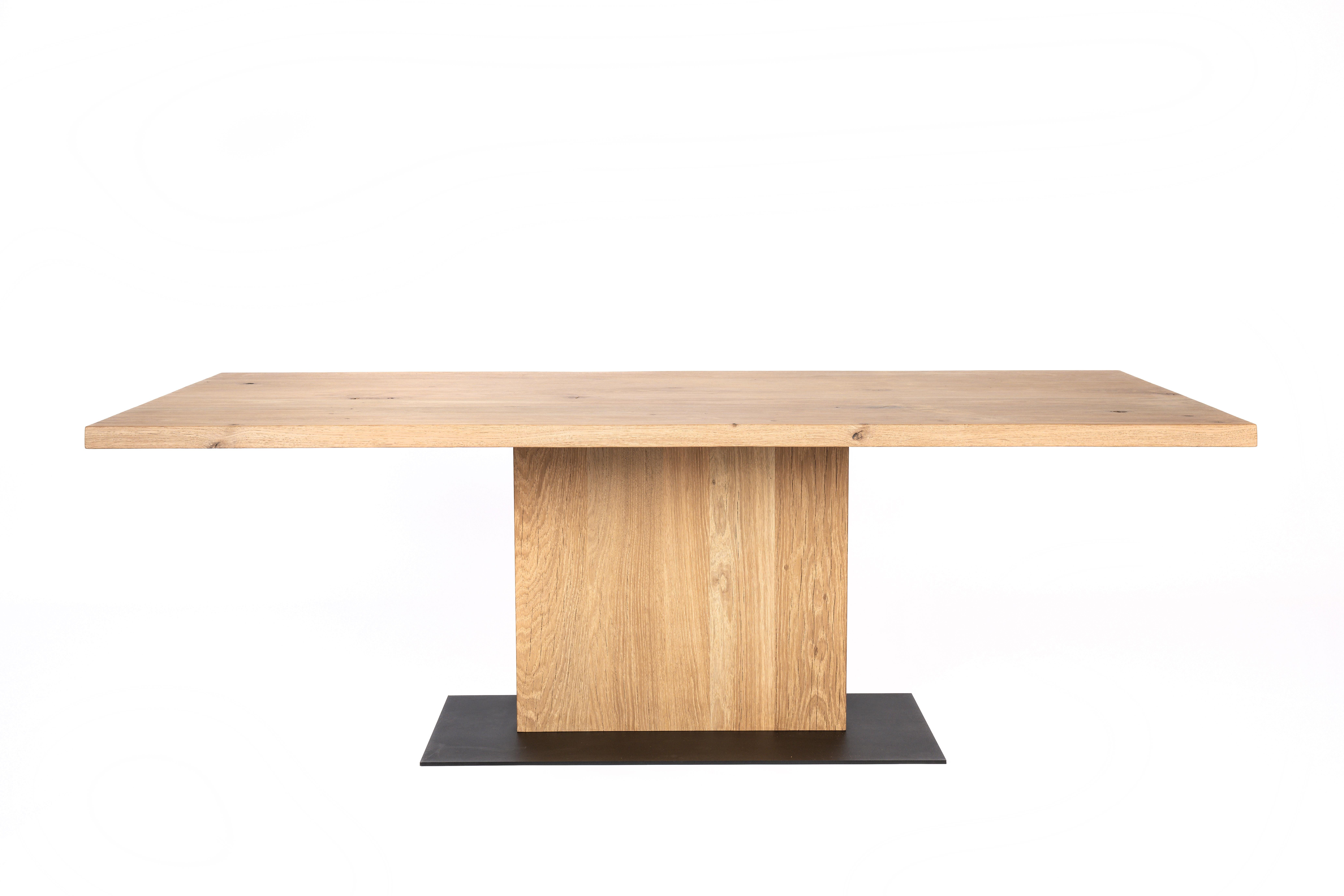 Introducing our Modern Rustic dining table with a floating top—a fusion of contemporary aesthetics and artisanal craftsmanship designed to elevate your dining area.
Crafted from solid baked oak with a natural rustic finish and a live edge, the