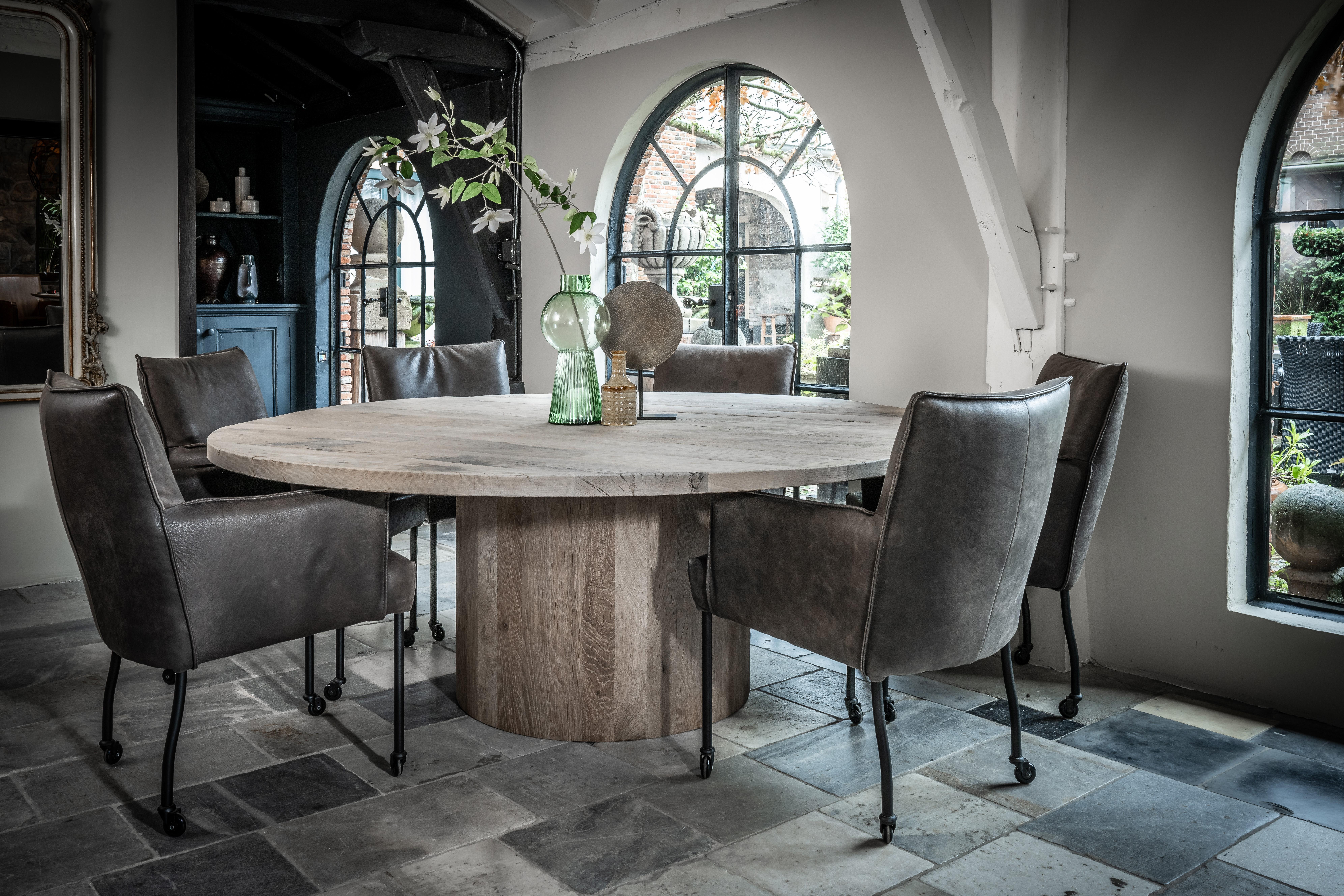 Introducing our round barrel table,  a stunning Modern Rustic dining table—an embodiment of craftsmanship and contemporary design, redefining the essence of circular dining tables for an unparalleled dining experience where everybody can see the
