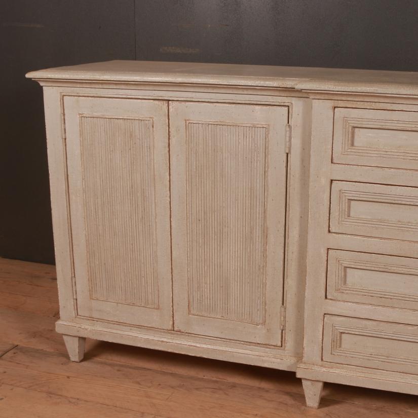 Custom made Swedish style breakfront sideboard. This can be made to your size and paint color.

Dimensions:
87 inches (221 cms) wide
18.5 inches (47 cms) deep
34 inches (86 cms) high.

 