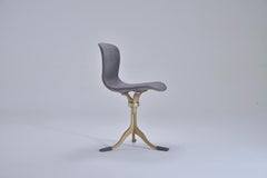 Bespoke Swivel Chair, Leather and Hand Cast Bass Base by P. Tendercool