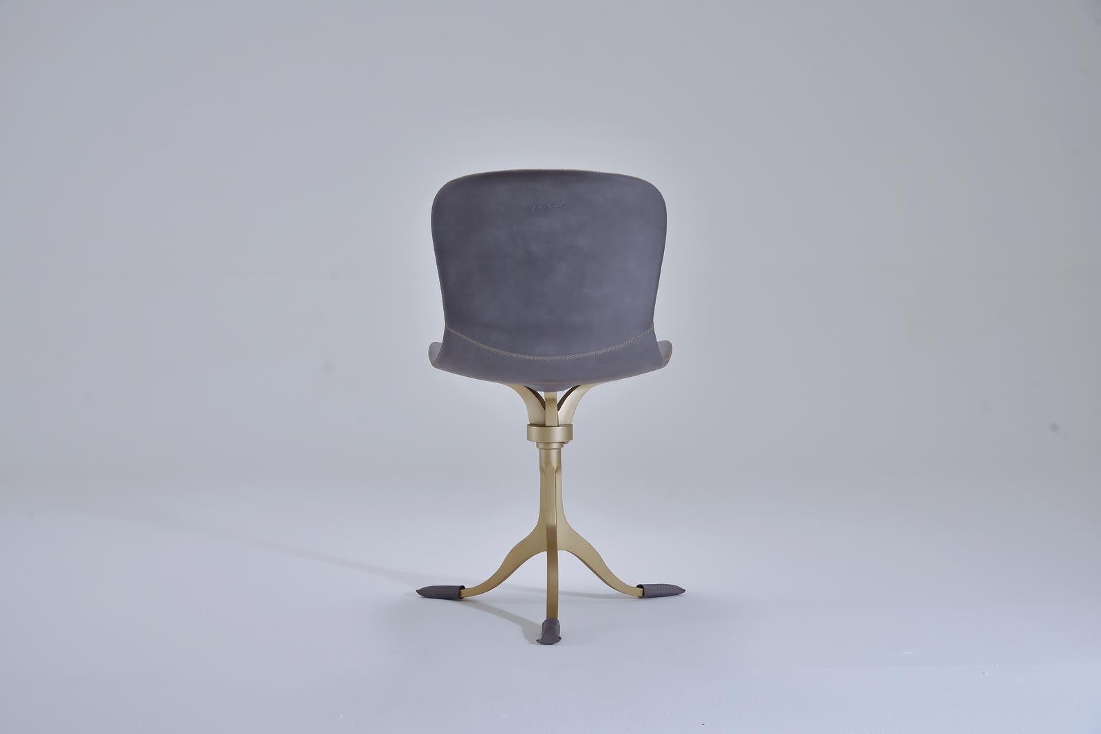 Thai Bespoke Swivel Chair, Leather and Hand Cast Bass Base by P. Tendercool For Sale
