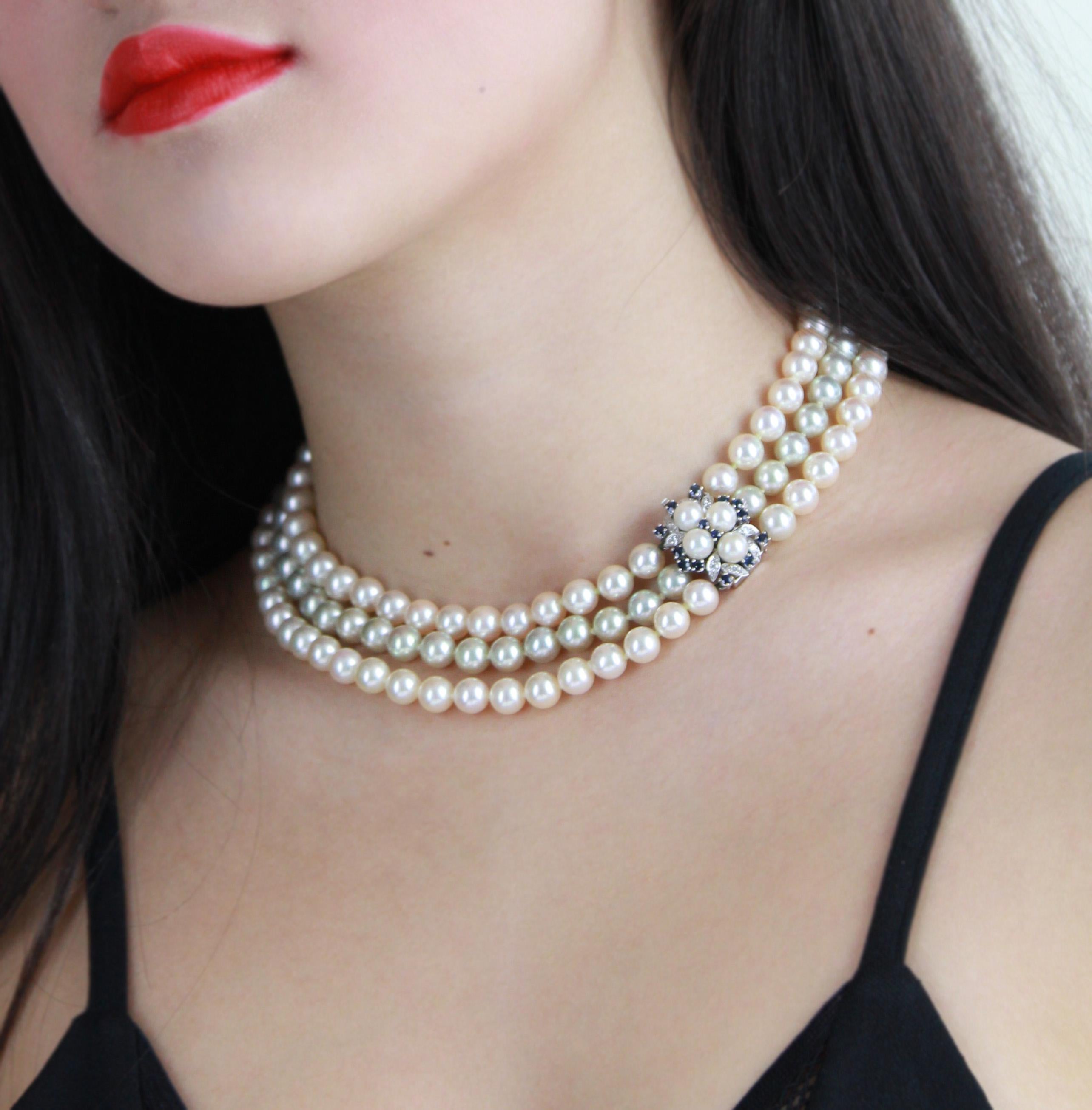 Elegant and iridescent, this timeless Akoya pearl three strand necklace combines elegance with a glamour of yesteryear.
The two outer pearl strands draw a pinkish hue to compliment the skin, whilst the centre strand draws a cooler greyish colour for