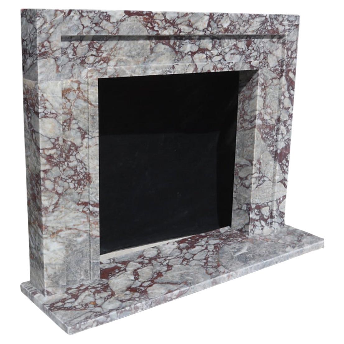This bespoke designer Viola marble fireplace mantel offers the ultimate in luxury and craftsmanship. Made to order, each mantel is meticulously crafted from exquisite Viola marble, ensuring a unique and personalized statement piece for your home.