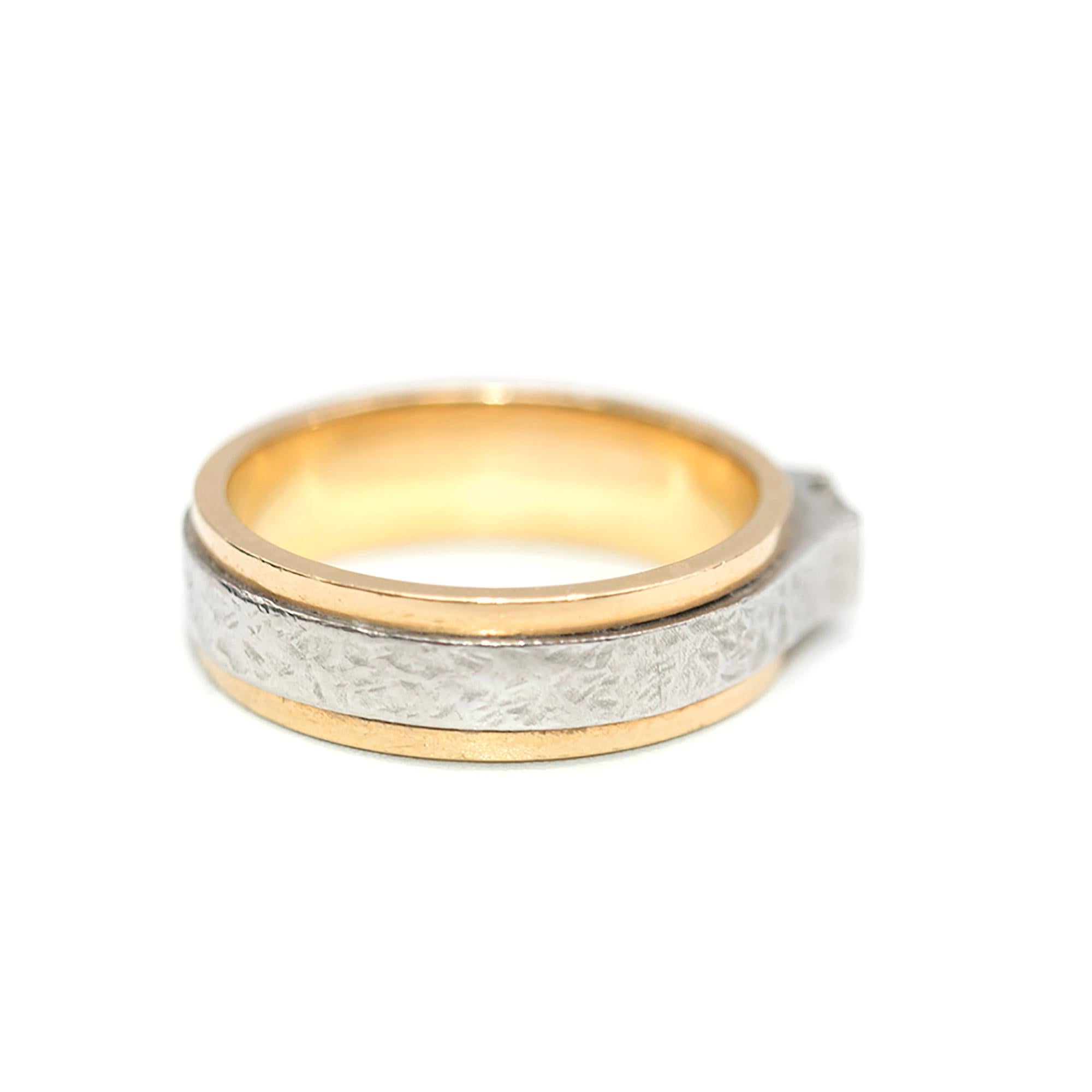 Bespoke Yellow Gold & Platinum Single Diamond Ring

18k yellow gold with hammered platinum overlay
One single bright white square diamond in center

Size US8/Q
Diamond Width: 2mm
Ring weighs 10.84g

Please note, these items are pre-owned and may
