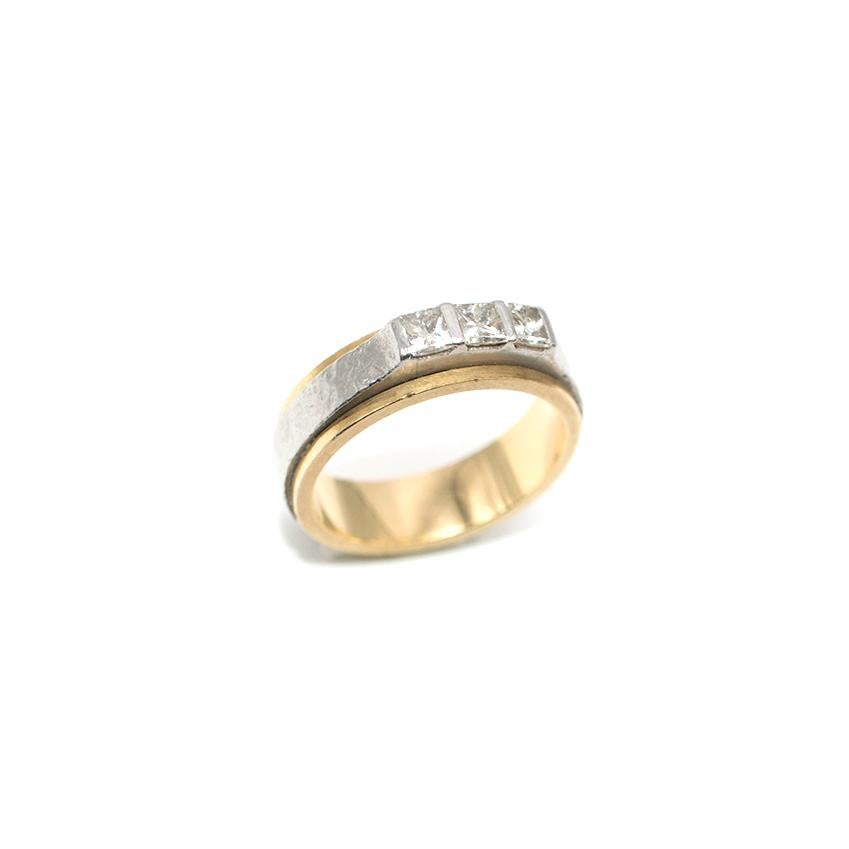 Bespoke Yellow Gold & Platinum Three-Diamond Ring

18k yellow gold with hammered platinum overlay
Three bright white square diamonds in center

Size US9/R
Diamond Width: 2mm
Ring weighs 12.1g

Please note, these items are pre-owned and may show