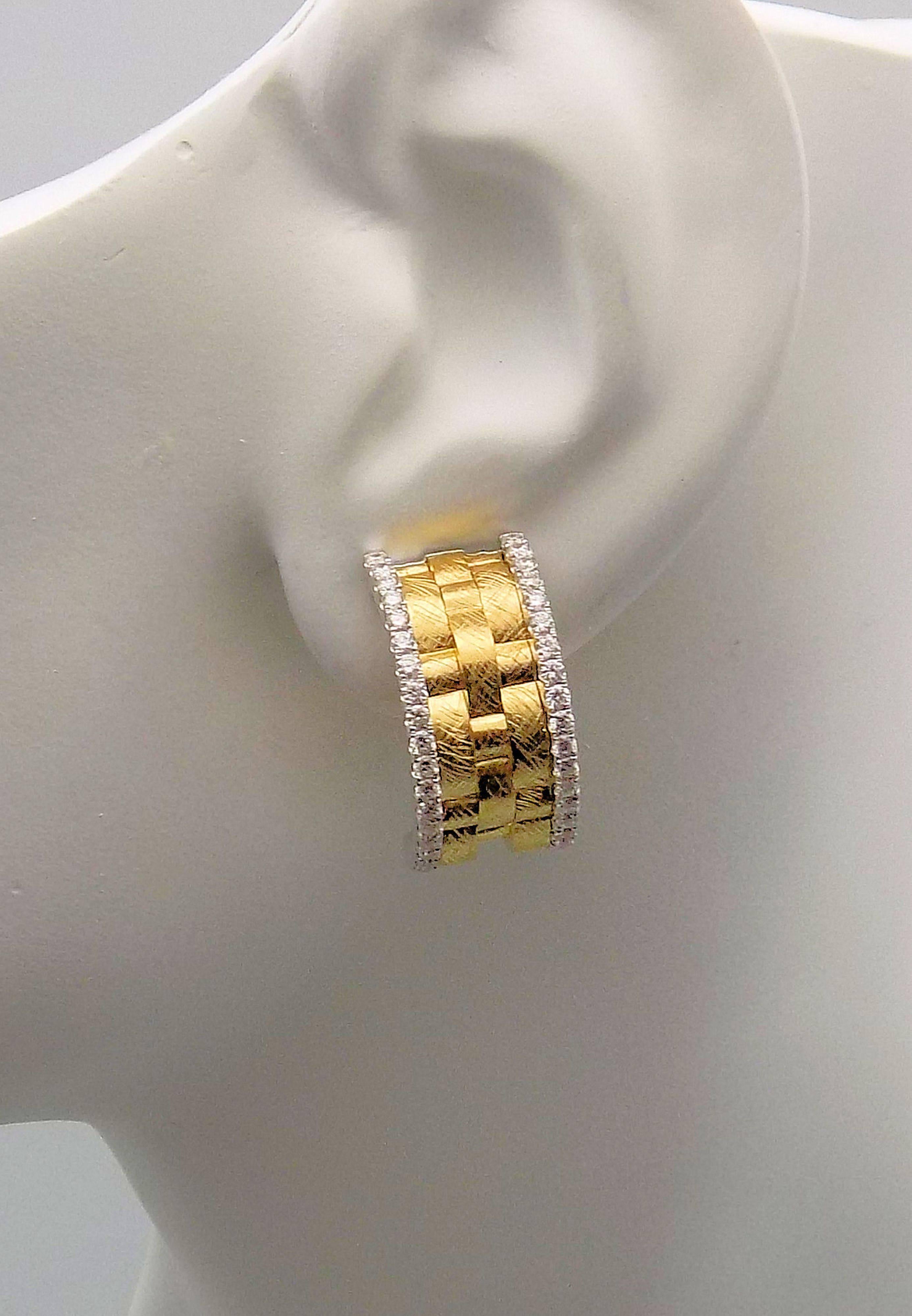 Stunning Pair of 18 Karat White Gold & Yellow Gold Pierced Convertible to Clip Earrings Featuring 80 Round Brilliant Diamonds 1.09 Carat Total Weight; SI, H; Signed: BESSA 9.2 DWT or 14.31 Grams.