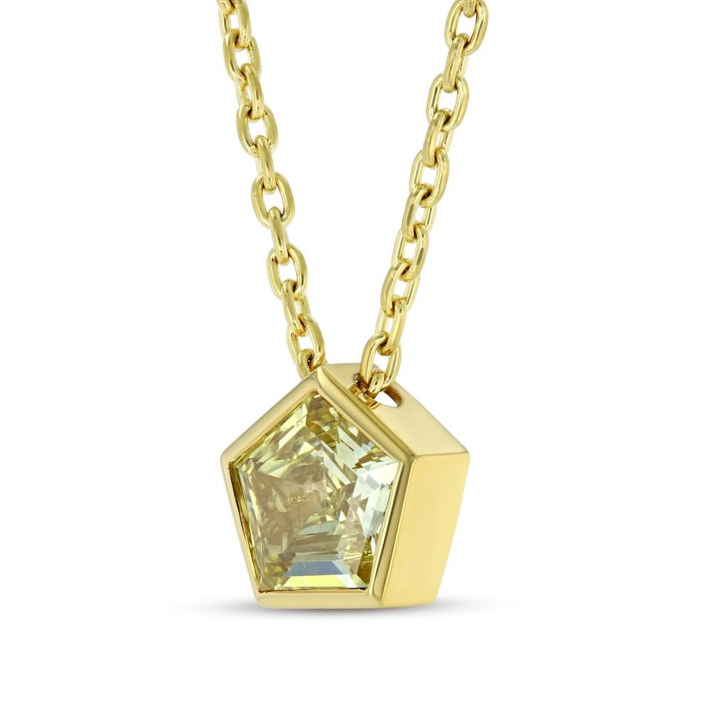 An extremely rare, extraordinary 2 carat natural fancy yellow pentagonal step cut diamond beautifully bezel set in 18k yellow gold. Includes 18k yellow gold chain and GIA certificate (Natural Fancy Yellow / VS2 clarity).