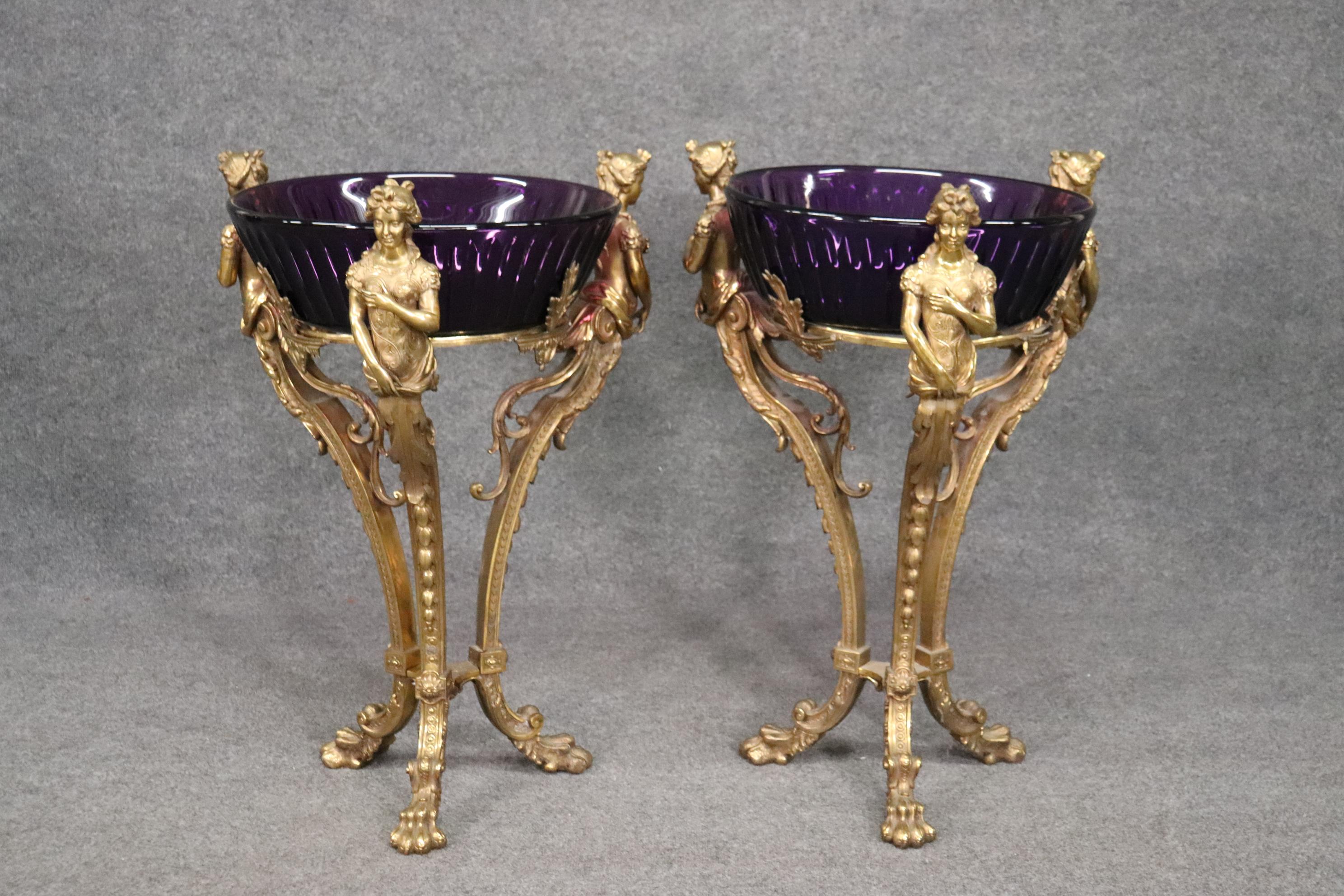 This is a stunning pair of Russian solid bronze figural wone coolers or urns. They feature some of the most realistic and naturalistic bronze castings we have had in quite a long time. The castings are crisp and look absolutely realistic. The