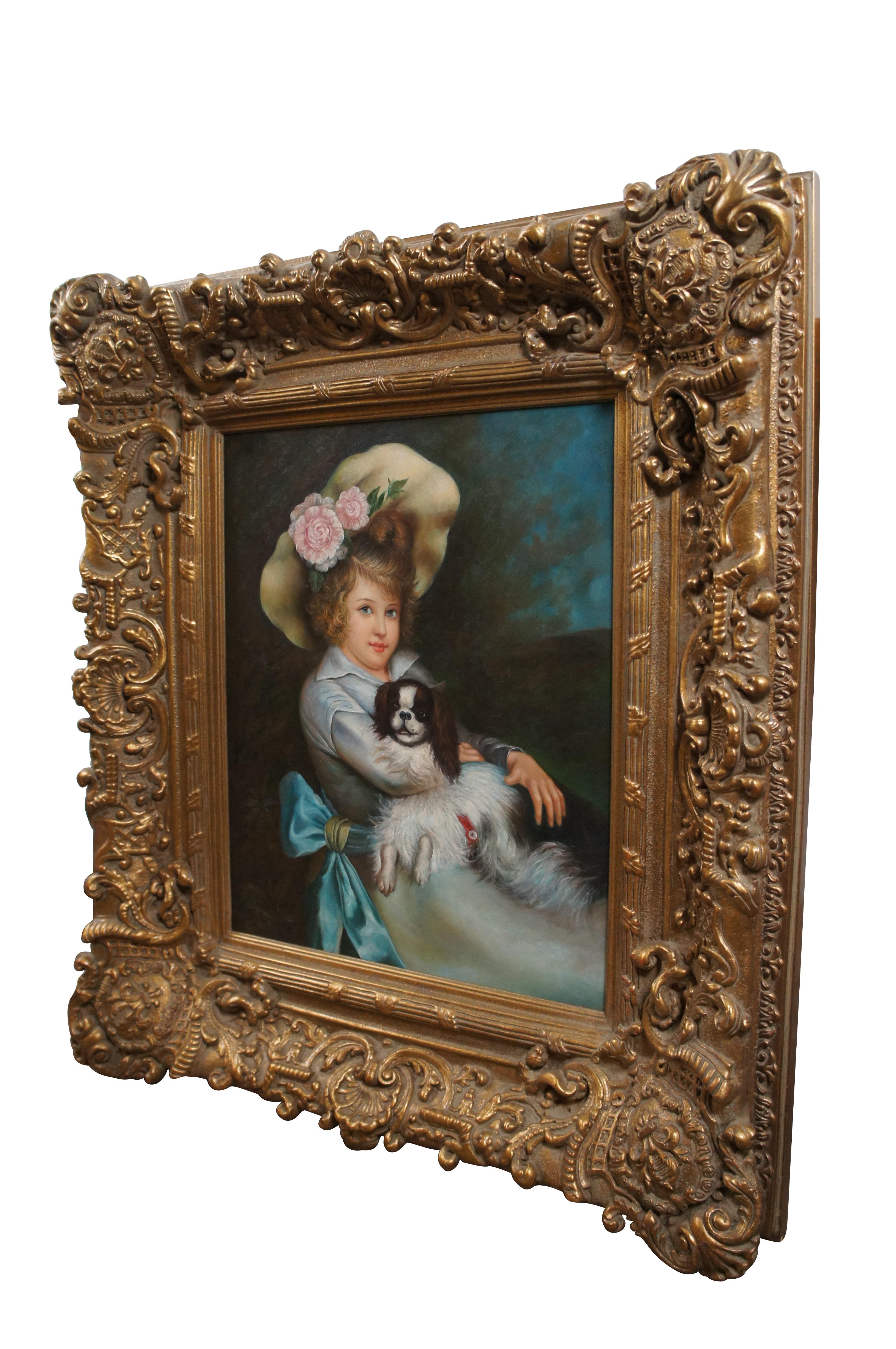 Late 20th century hand painted reproduction oil on canvas portrait painting after “Best of Friends” by Harry Humphrey Moore, showing a young girl in a flowered hat and blue sash, holding a brown and white King Charles Spaniel dog on her lap.