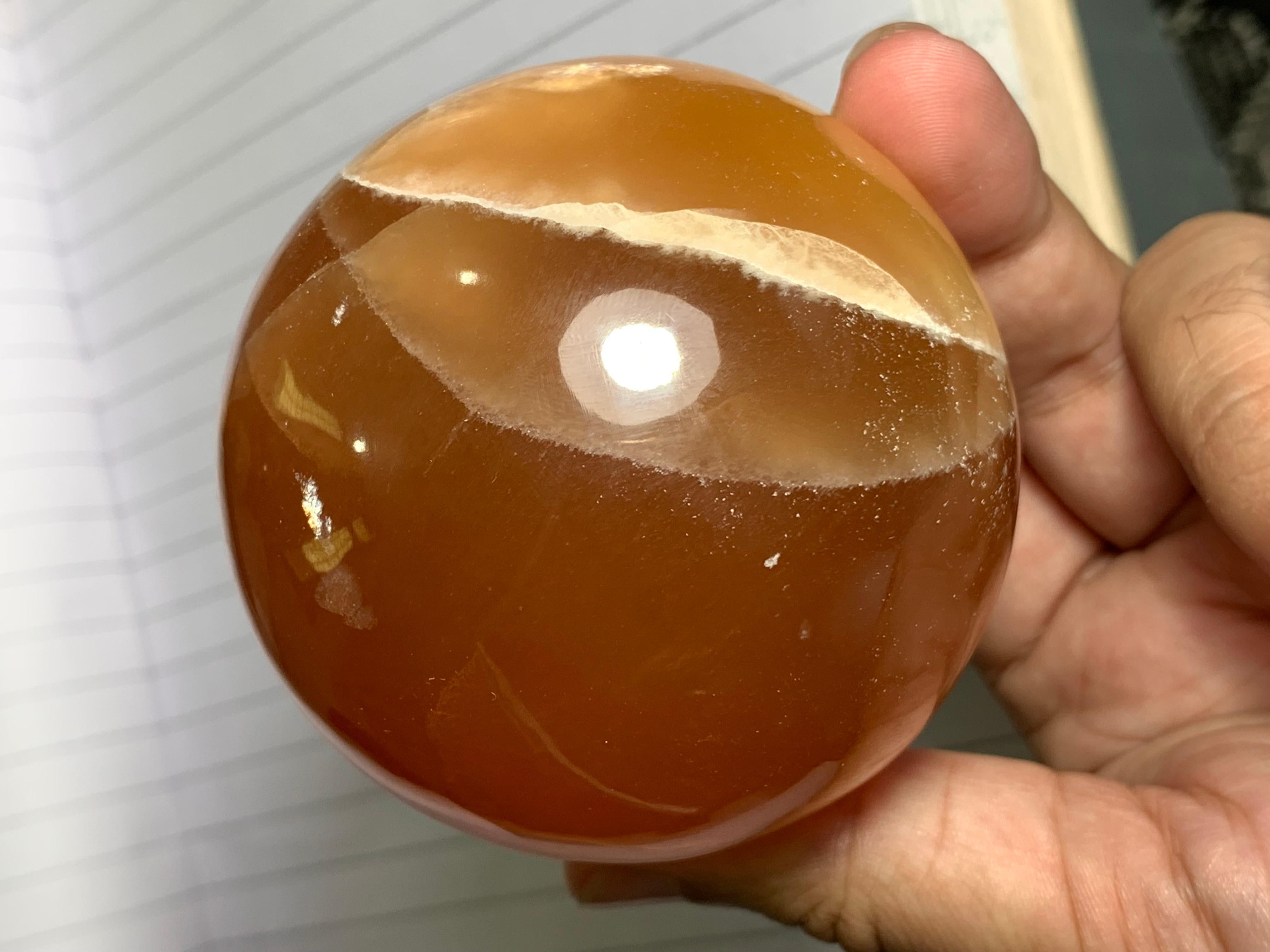 Best Quality 548 Gram Red Honey Calcite Sphere For Sale 1