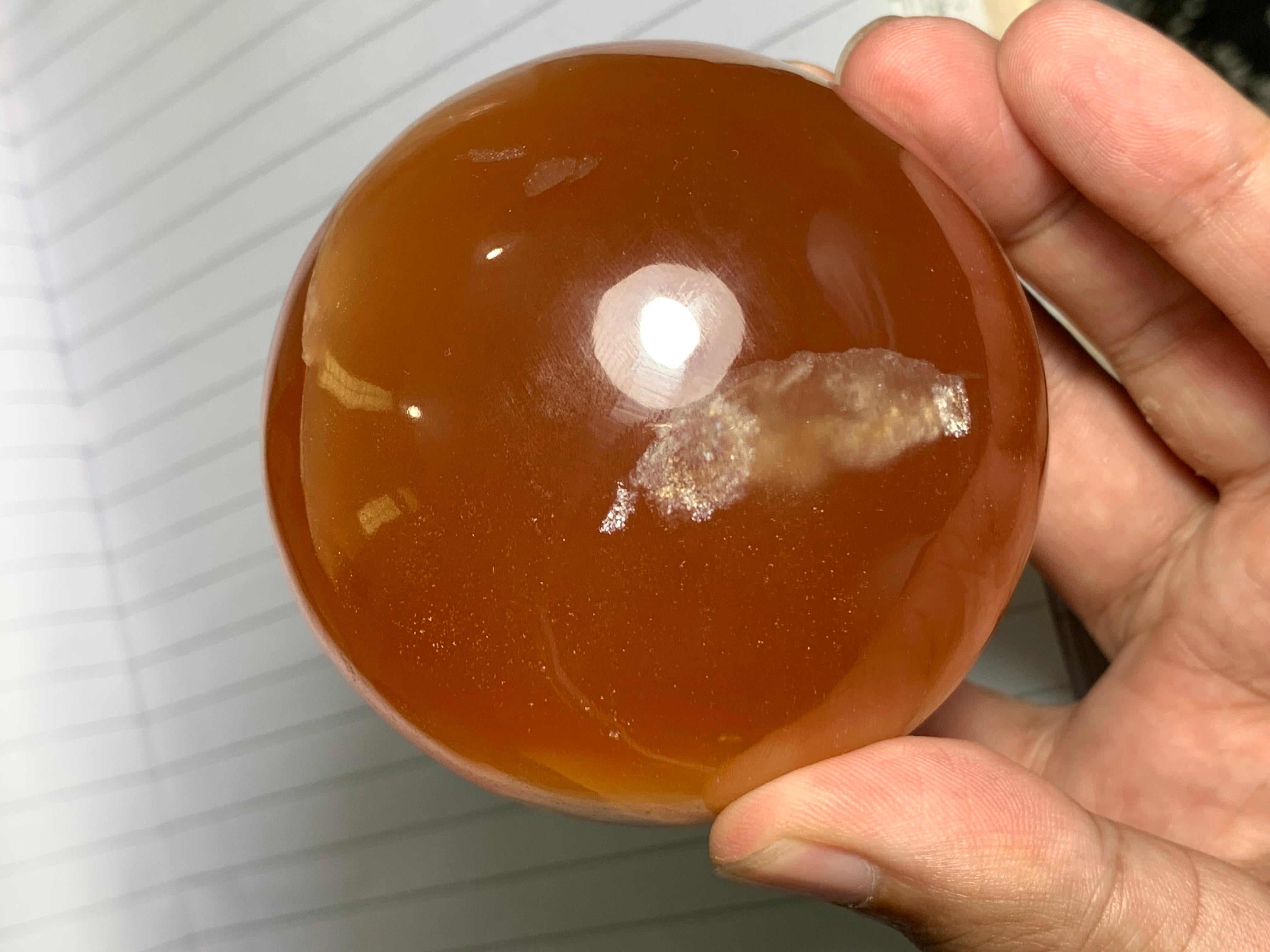 Best Quality 548 Gram Red Honey Calcite Sphere For Sale 2