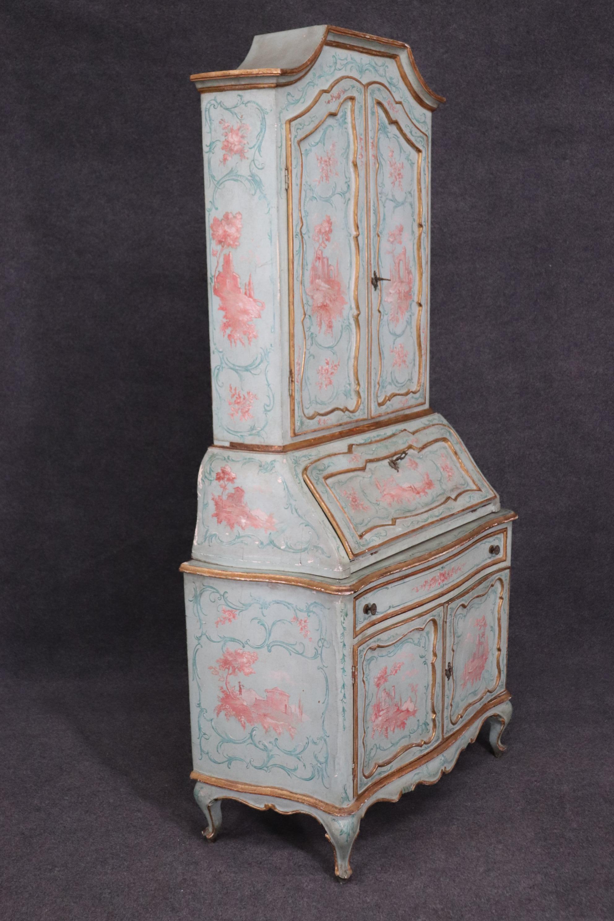 This is a very sophisticated and beautifully painted secretary desk. The painted scenery shows pastural scenes and the old Italian countryside with ancient ruins and figures. The secretary measures 82 tall x 41 wide x 18 deep. The piece is done in a