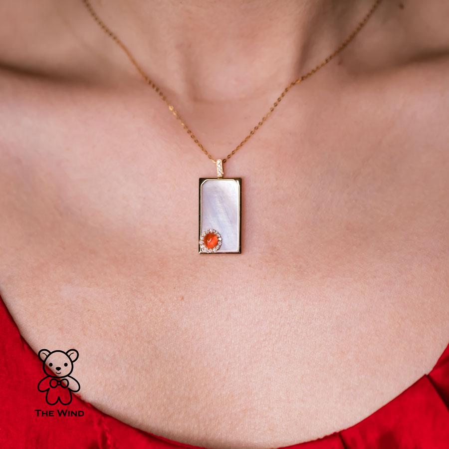 Best Wishes - Mexican Fire Opal Halo Diamond & Mother of Pearl Pendant Necklace 18K Yellow Gold.


Design Name: Best Wishes
Wishing you happiness, safety and health!

Design Idea:
Introducing “Best Wishes,” a beautiful rectangular Milky-white Mother